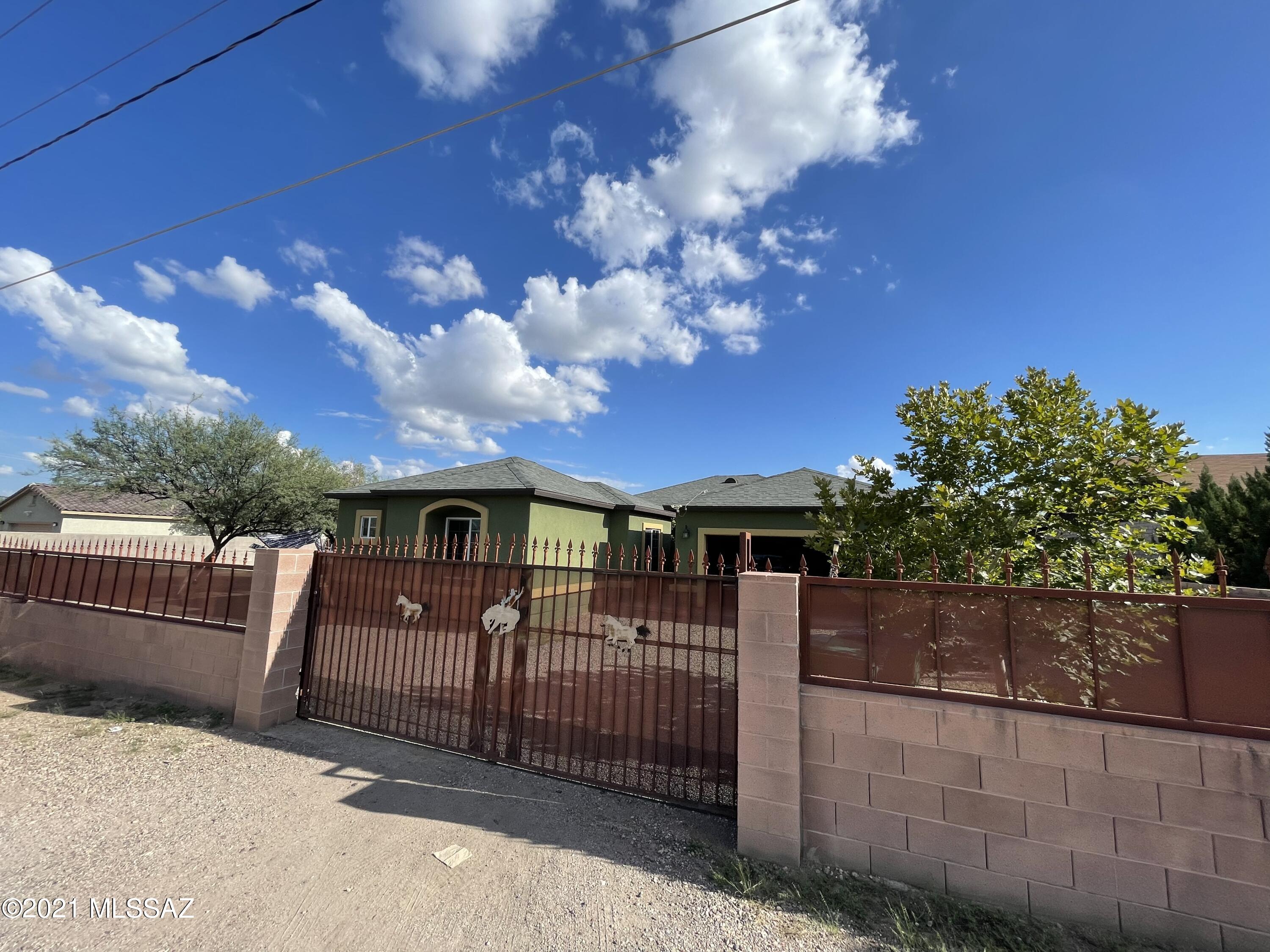 Beautiful 4 Bedrooms and 3 bathrooms with a Den room. Built on 2014, High Ceilings and tile floors throughout the house, granite counter and stainless steel appliances. Large Lot with space to park RV, cars etc. NO HOA and Block wall around Lot. This one wont last.