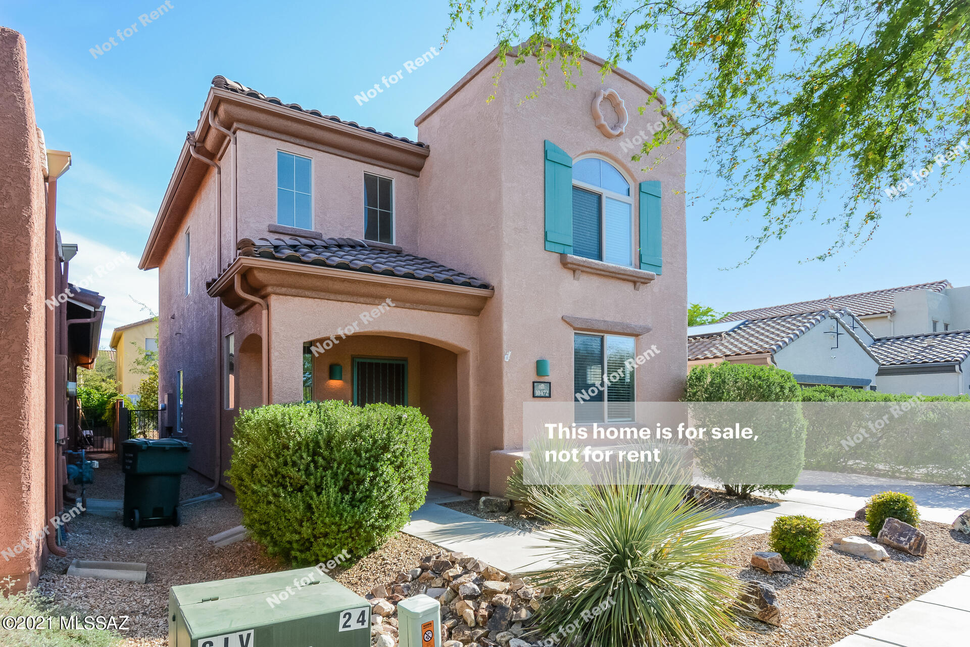 This Tucson two-story home offers granite countertops, and a two-car garage.