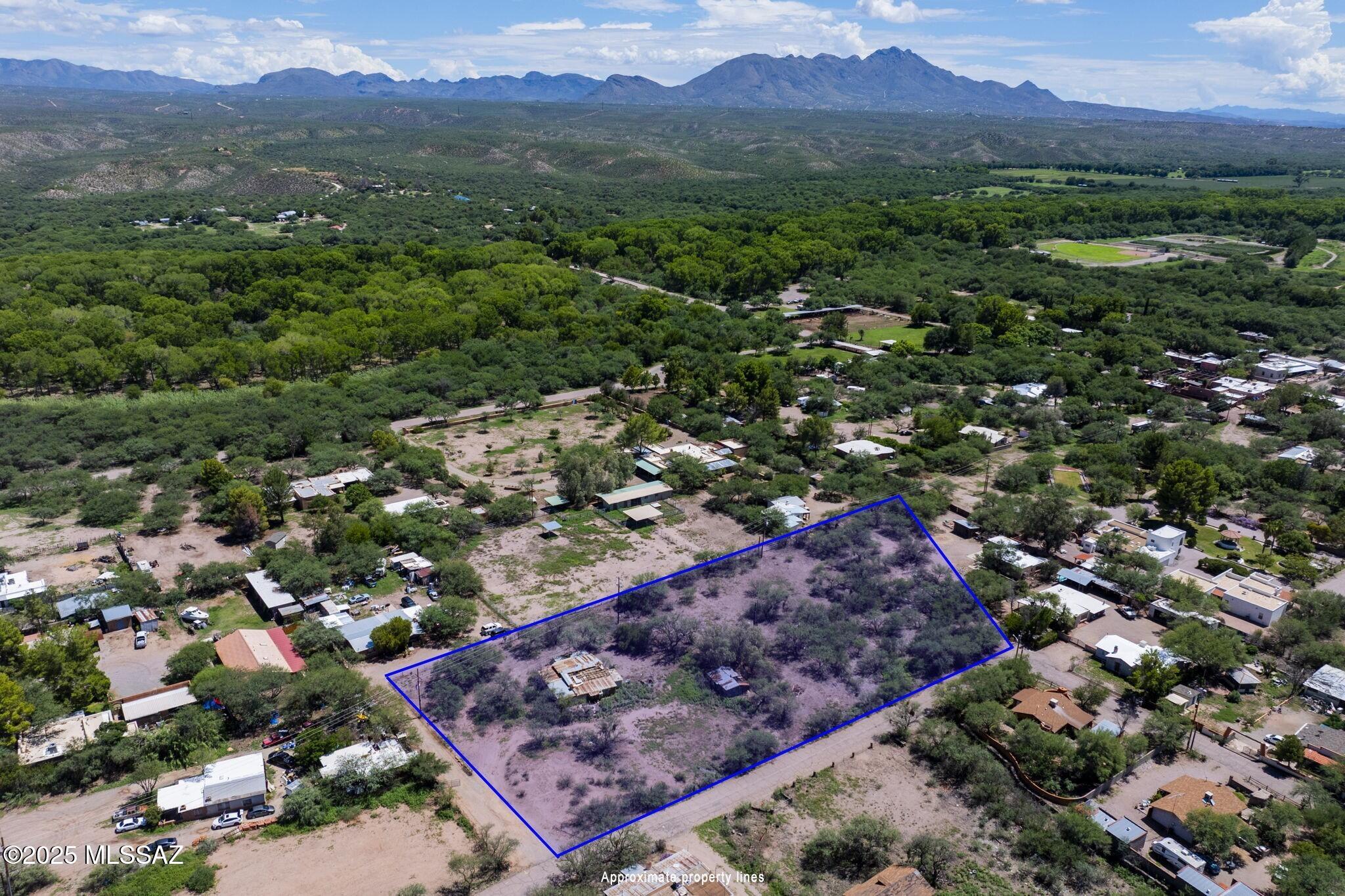 Discover a rare opportunity in Tubac with this spacious double lot located in the Valenzuela Subdivision. This unique offering includes two adjoining parcels—21 Calle Solares and 15 Buckley Lane—providing ample space, flexibility for your vision, a private well and no HOA. The property currently features a non-livable building that conveys with the sale. With generous acreage, a prime Tubac location, and the charm of the surrounding community, this property presents an exceptional canvas for your dream home, investment, or retreat.