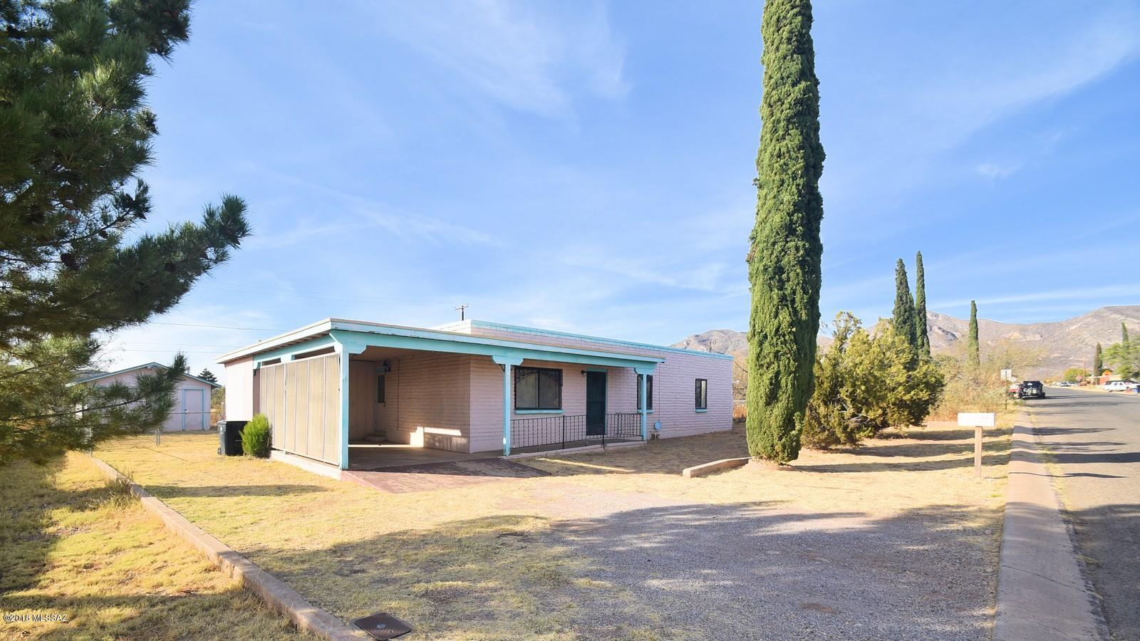Views for miles! This lovely cheery home is the perfect size and location to enjoy all that Bisbee has to offer! Easy floor plan has plenty of
space in all the right places. Great big family room is perfect for living and entertaining. Kitchen is well laid out for the cook at heart. Dining area is ideal for gathering
and sharing good times. Generously sized bedrooms and conveniently located baths. Workshop and storage area for enjoying hobbies and secure storage. Arizona
room for additional living space. Enjoy the beautiful Arizona sunsets from your completely fenced back yard. Plenty of space for outdoor living. Garage, RV gate and
space for RV parking. All within walking distance to shopping and dining. Perfectly priced, this is the one!