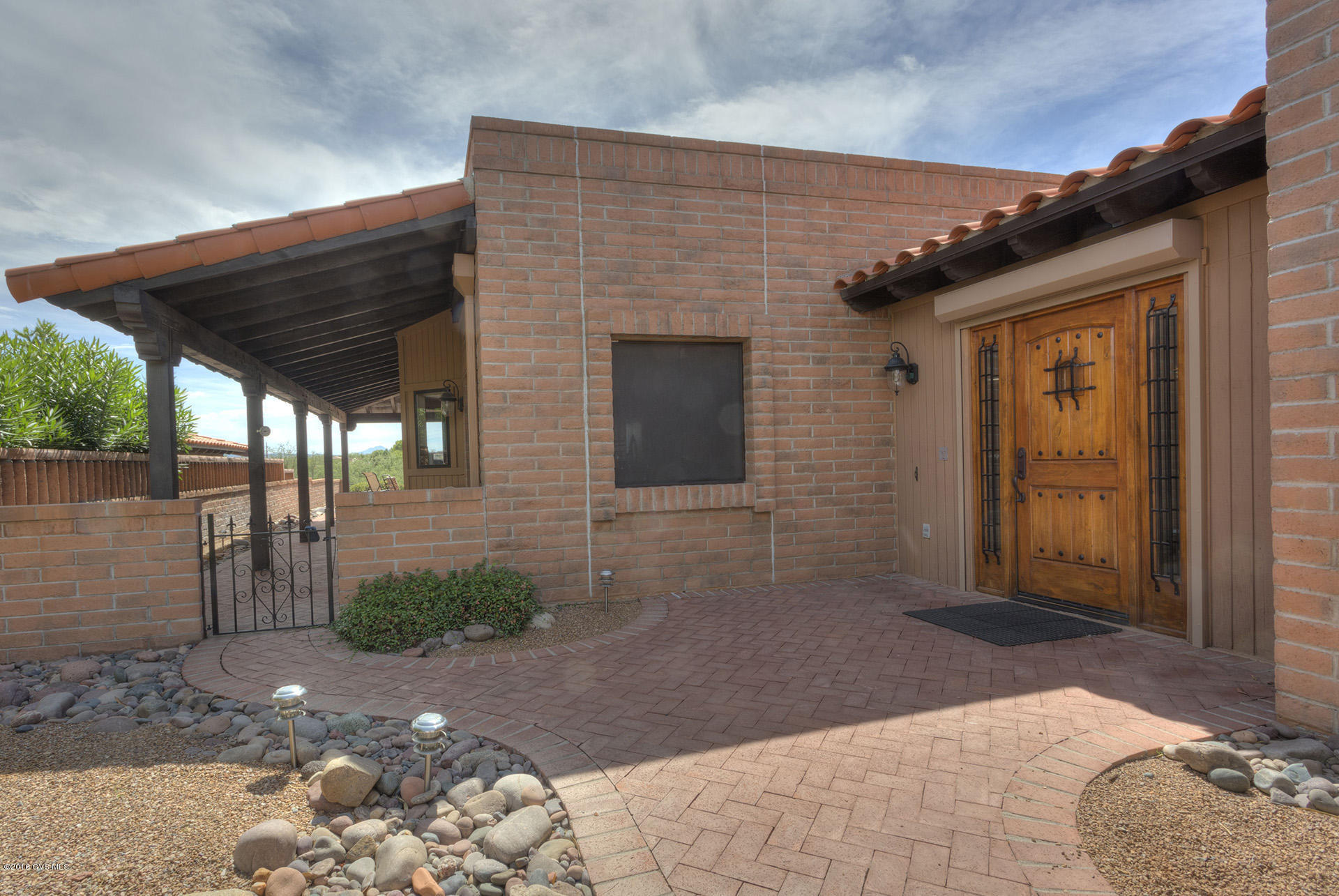 Glorious views, stunning home! Expanded Miramar-entry foyer, den, great room with a gas fireplace and entertainment bar, eat-in kitchen..granite countertops & stainless steel appliances, very large rooms, great storage, soaking tub in the Master bath and a BIG Garage. AND OUTSIDE just amazing spaces with spectacular views in all directions. ''L'' shaped patio, wonderful covered space and super easy care yard as there are pavers and excellent sitting areas all over! Plus a screened in area just off the Master bedroom. Everything is super lovely.