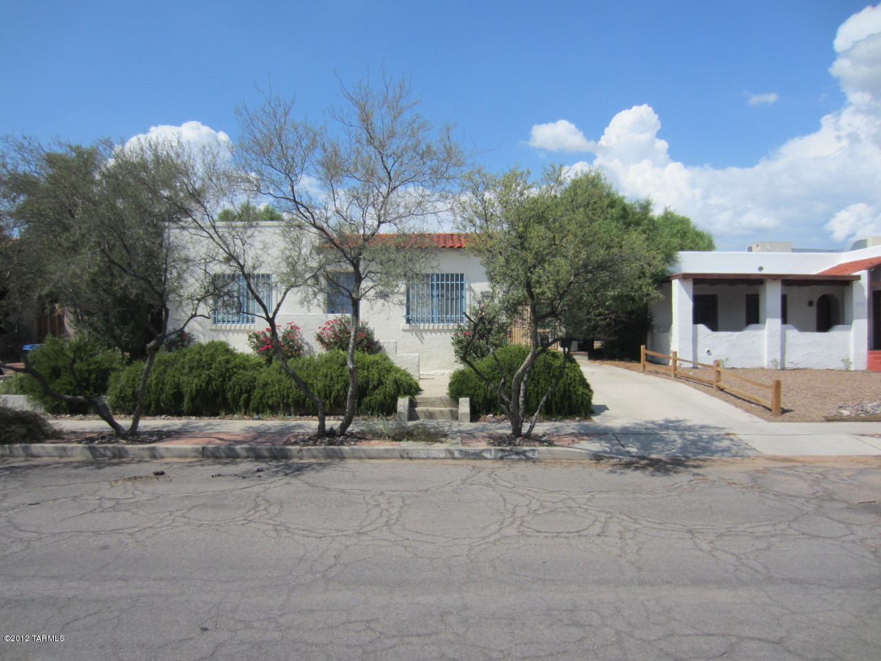 AVAILABLE NOW! This 1929 Sam Hughes charming 3 bed. 2 ba. is just 2 blocks from the U of A. Amenities include a spacious living rm., formal dining, oak floors, & a good amount kitchen cabinetry & counter space. There are 2 good size bdrms. with individual A/C units in the main house & the 3rd bdrm. is located in the adjoining studio just a couple of steps from the side porch. The 3rd bdrm. is spacious, it has Saltillo tile flooring, A/C, & a full bath. For your convenience there is a coin operated laundry on site. Contact the listing agent or your own agent to schedule a showing & to learn of the best viewing days & times for vacating tenant. Let us know if you questions regarding this rental, our standard lease terms, our rental application requirements,and/or the pet policies.