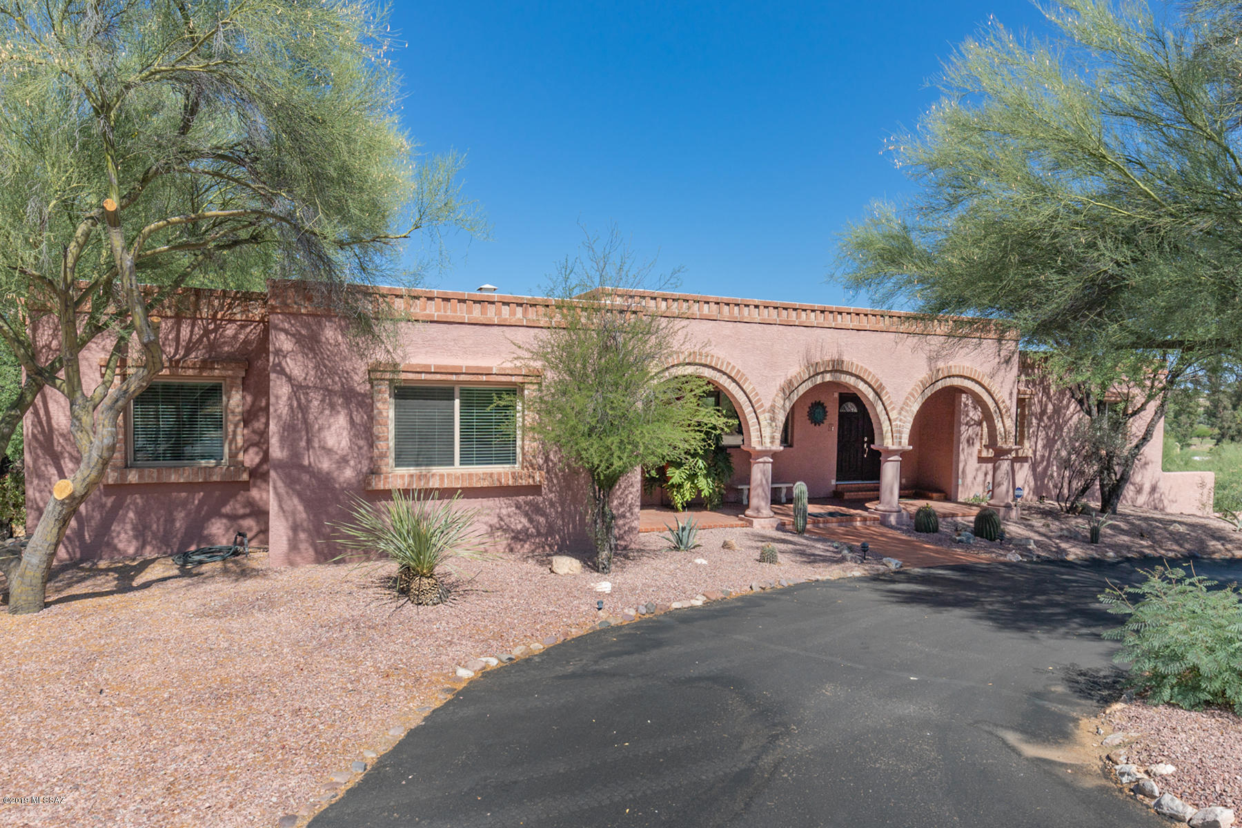 TUCSON NATIONAL ESTATES!!
Do you need room for your parents??? .....Or.... Do you need space from teenagers? Maybe this home is for you.....Two story- 4 bedroom, 4 bath, 3 car garage masonry stucco home that has it all!  First floor:   full kitchen, dining room, living room, large family room/great room with fireplace. Master bedroom suite with romantic fireplace, and large covered porch overlooking the Golf course and bedroom/office with private bathroom.
2nd floor:  full kitchen with breakfast bar, large family room, 2 large bedrooms with private bathrooms, large laundry/hobby room, entrance from garage, covered porch and pool access.  Run don't walk to this fantastic home.