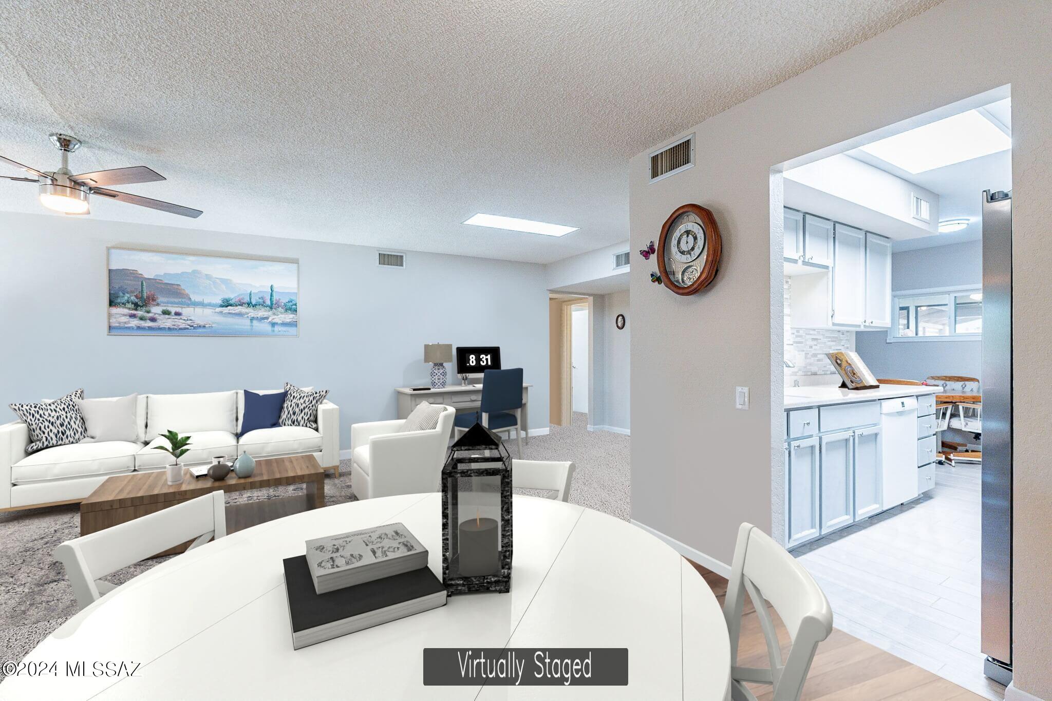 Welcome to this charming fully furnished townhome nestled in a serene cul-de-sac neighborhood, offering a perfect blend of comfort and convenience. Boasting 2 bedrooms and 2 bathrooms within 1087 sq. ft., this home features a tastefully upgraded interior highlighted by newer appliances and HVAC installed in 2018. The open floor plan floods with natural light, creating an inviting ambiance throughout. Step into the tranquil enclosed Arizona Room, perfect for unwinding or entertaining guests. Outside, an extended driveway leads to a welcoming back patio, where breathtaking mountain views await. Conveniently situated near the town center, enjoy easy access to shopping and restaurants while relishing the peace and quiet of the surroundings. Additionally, this property includes access to Green Valley Recreation (GVR) membership, granting entry to 13 recreation centers equipped with pools, exercise facilities, and a many clubs and activities tailored for the active retiree. Embrace the Green Valley Retirement lifestyle in this idyllic haven.  Furnished and ready to go!