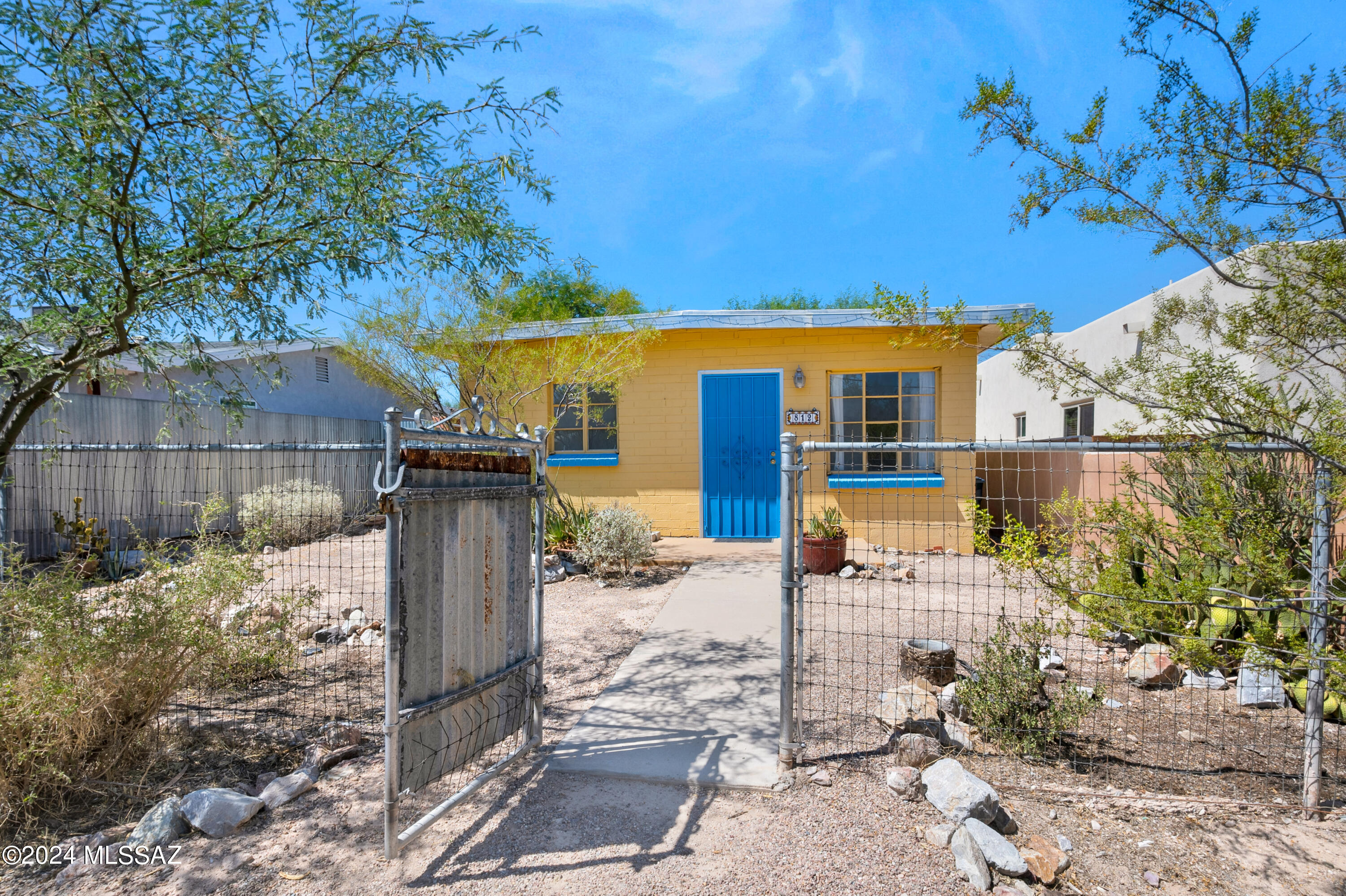 Range Priced $300,000 to $325,000. Cute as a button! Renovated & easy, low care 1950's home just south of downtown. Fabulous Walkability to 5 Points, the excitement of downtown Tucson & all the happenings. Bike Score of 96 & WalkScore of 77! Smart open floorplan with the kitchen open to the living/dining space. Updated kitchen with modern touches makes entertaining a delight & a breeze! Two sizable bedrooms with fabulous natural light. Recently updated bathroom. Newer luxury vinyl plank flooring throughout for easy care. Native/desert adapted landscape with grey water established to feed your desert garden. Storage shed in backyard to keep your tools, bikes, toys or convert it to your next She-Shed / Man Cave or an art studio! Fabulous downtown street with lots nearby. Move right on in!