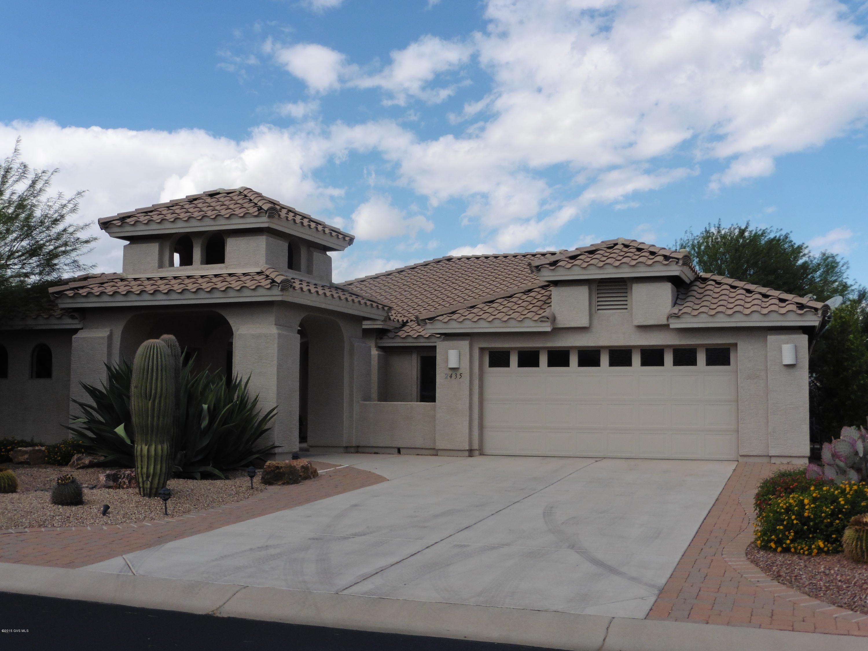 Great home inside and out - enjoy the amazing Arizona sunsets from your back patio. Kitchen features include large pantry cabinet, gas range, breakfast bar and copious cabinets. Spacious master suite with bay window, 2 closets, linen closet, water closet and large shower. The split floor plan features a great room, well appointed master suite, breakfast nook, living room, and dining room. Low care landscaping, 3 garage spaces, 2 water features, and common area on one the side.