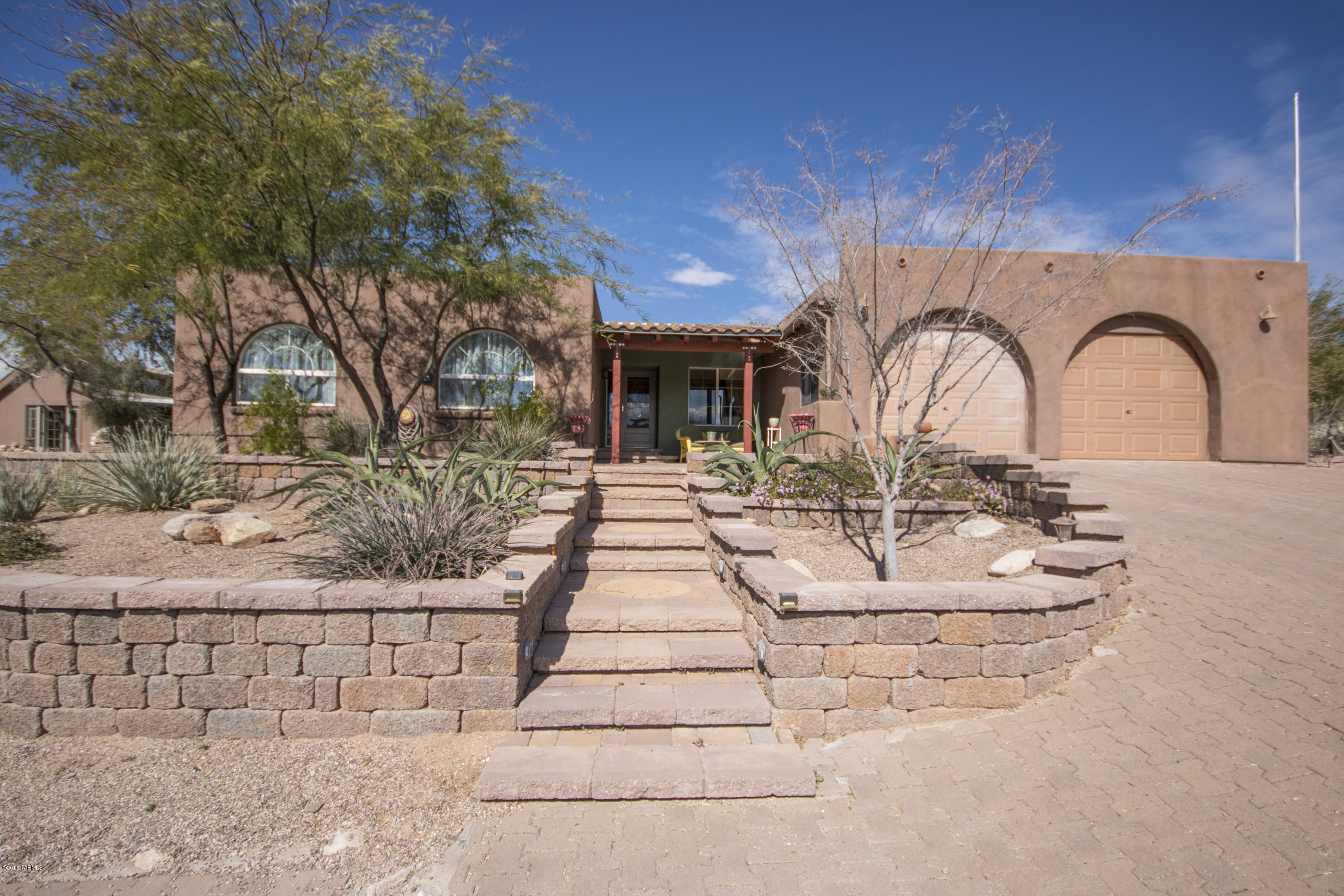 Come check out this peaceful, tranquil, desert property that has been beautifully done to showcase an amazing kitchen, Modern bathrooms, large patio areas, storage space throughout, and a separate workshop area perfect for woodworking or storage. The pavered driveway and immaculate front curb appeal make this home a must see!