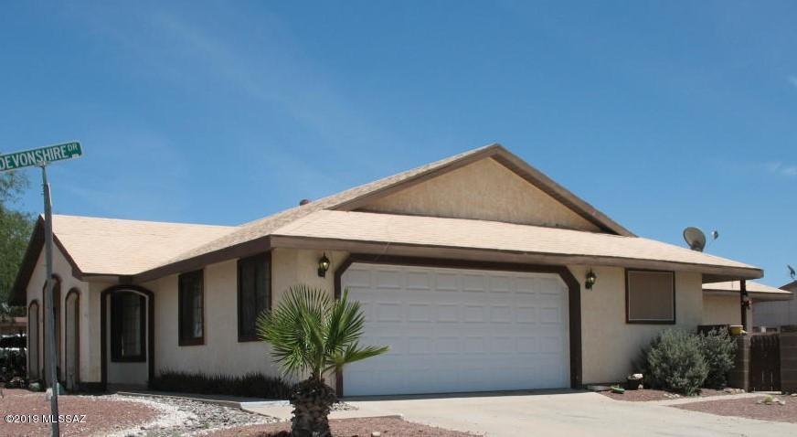 Large 5 bedroom, 4 bath, 2088 sf home on a corner lot in need of some TLC! Bedrooms are split...3 beds/ 3 baths on one side, and 2 beds / 1 bath on the other side (with separate AC and small kitchen area...can be mother-in-law suite). Two bedrooms have private bathrooms, and two bathrooms have jetted tubs. Additional features include formal dining room, 2-car garage, saltillo flooring, newer appliances, large backyard, and NO HOA! Seller is licensed to sell real estate in AZ.