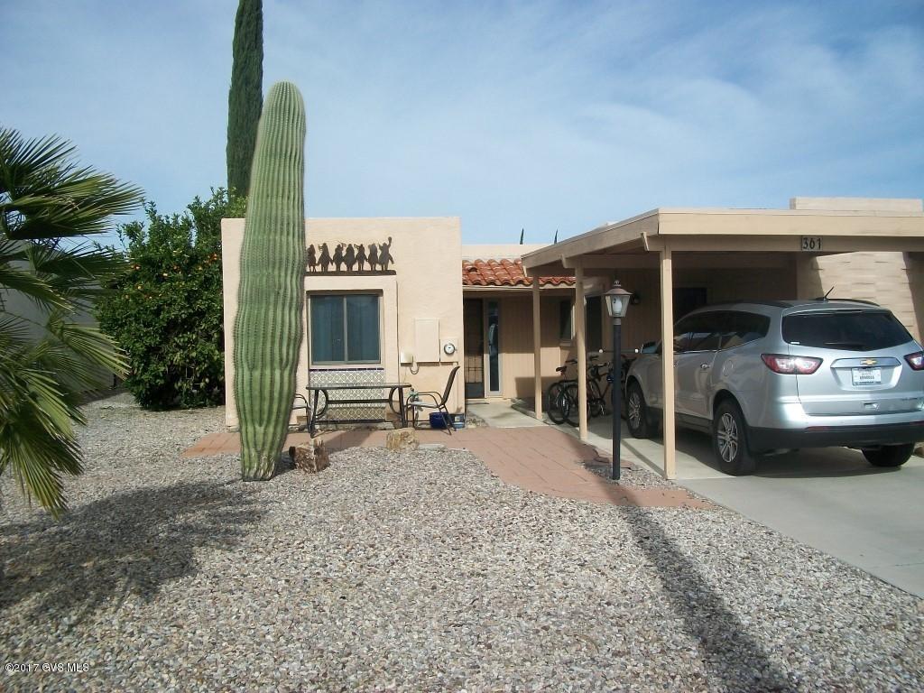 Mountain Views from front patio. Sunset views from rear patio. Nicely landscaped, low care. Nice orange tree. Newer kitchen cabinets, one has pull out shelves. Hall bath newer vanity. 18'' tile in living room & both bedrooms. All new Anderson windows 2015. New PSHA sliding door 2016. New hot water tank 2015.