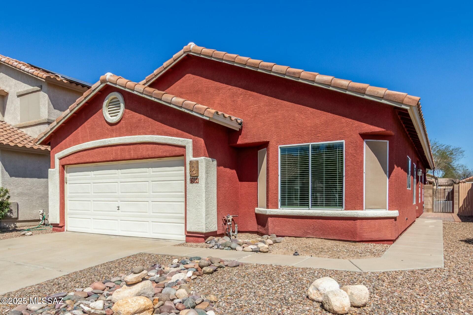 Discover comfortable living in this inviting Continental Ranch rental! This spacious home offers 1569 square feet of living space, featuring 3 bedrooms and 2 bathrooms, and 2 car garage. Perfect for families or those seeking extra room.

Enjoy the convenience of being located near shopping centers, excellent schools, and a variety of entertainment options. The Continental Ranch HOA provides a wealth of amenities, including two refreshing swimming pools, a relaxing spa, a fun skate park, and a versatile ball field, ensuring there's something for everyone.  Close to the Loop, golf, Saguaro National Park, hiking, biking