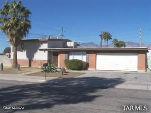 Desirable home on Tucson's East side. Tri-level 5 bedroom 2 bath. Fresh paint. 2-car garage and RV parking! Enjoy outdoor living with a patio, large backyard and a fully-fenced in pool. Owner pays for regular pool maintenance! This home has hardwood floors and tile throughout. Close to shopping, schools, transportation and entertainment.
Don't wait, schedule a tour of your new home today!