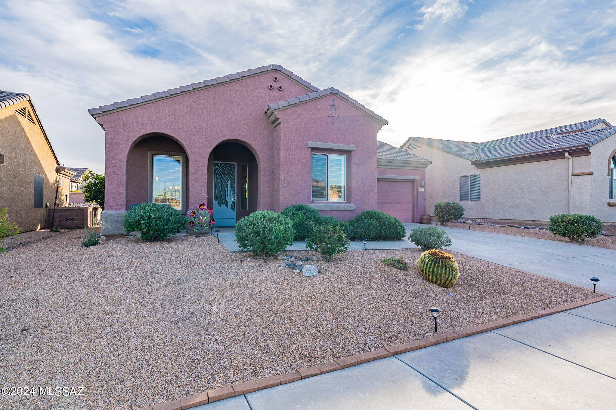 Enjoy quality living in the highly favored gated community of Canoa Ranch. This home boasts ALL Tile flooring, stainless appliances, a gas fireplace, and a solar powered shade cover for outdoor enjoyment. Experience the beautiful desert sunrises and mountain views from the comfort of your backyard. These features are accompanied with high ceilings, a bonus den/office room, new AC and water softener. It's conveniently walking distance from GVR community center and Canoa Ranch Resort. Both have plenty of amenities such as indoor/outdoor pools, pickle ball, and golf. Whether you are looking for a seasonal or full time stay, the combination of quality and location make it a great option for both interests. Don't miss out on this great opportunity! *Assumable VA LOAN*