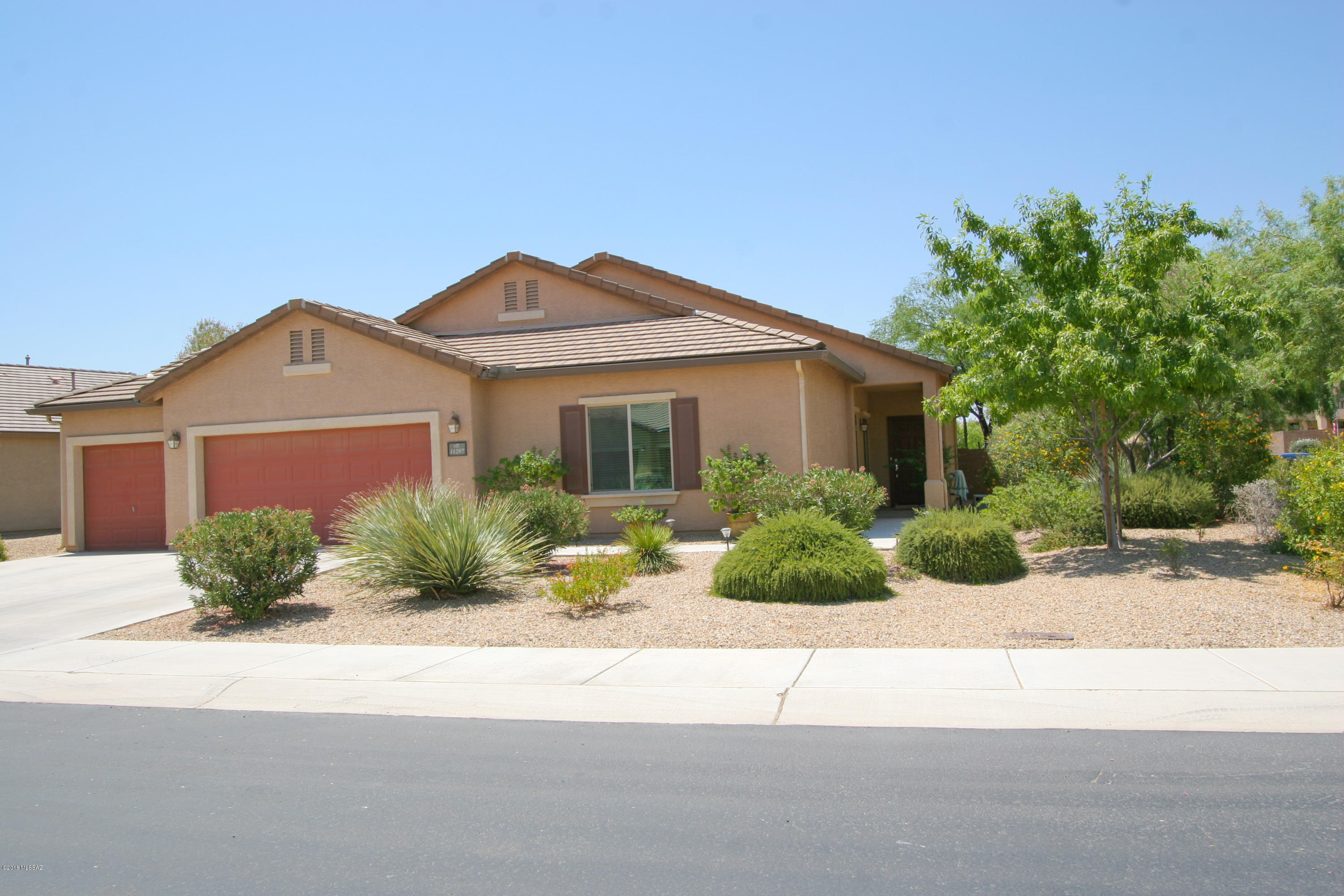 Beautiful open floor plan Pulte home loaded with upgrades. Massive great room highlighted by chefs kitchen with Ubatuba granite counters and upgraded dark cherry cabinets w/pull outs and crown molding. Enjoy cooking for the family with the gas stove with double oven! Neutral tile flooring throughout the home except in the bedrooms where plush carpeting will keep your toes warm and cozy. Master suite boasts a large master bath with Separate shower and garden tub, his and hers vanities and a very spacious walk-in closet. The guest bedrooms feature large closets and spacious accommodations plus a large bonus room and a 3 car garage! All window treatments potted plants and appliances convey!