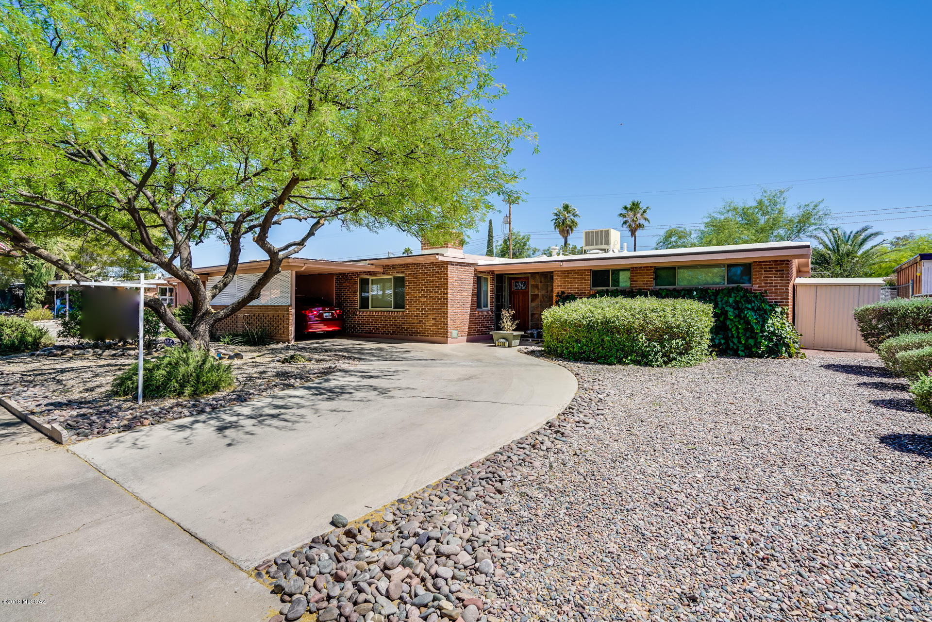 Believe in Miracles! Rare opportunity to  own a beautiful updated home featuring granite kitchen & baths, tile floors, A/C gas firerplace, great rm floorplan and 2 outside storages. Bonus rm too! Office/play rm off dining rm! Discover the large laundry rm with many cabinets and dr to outside. Captivating outdr living includes spacious wlll yard w/sparkling pebble tech pool, covered patio and play area! Popular east side  neighborhood- close to a YMCA, schools shopping and restaurants!