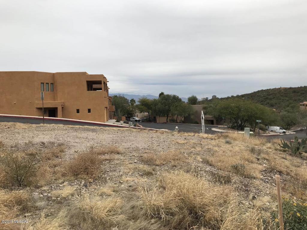 Incredible opportunity to live MINUTES from Downtown Tucson, U 0f A, Tucson Street Car and I-10! Located at the base of A MOUNTAIN, this corner lot is ready for your forever home! Paved road and all utilities are located at the lot line. HOA has approved floorpans with 3 bedrooms, 2 baths and 1,897 square feet. Amazing views!