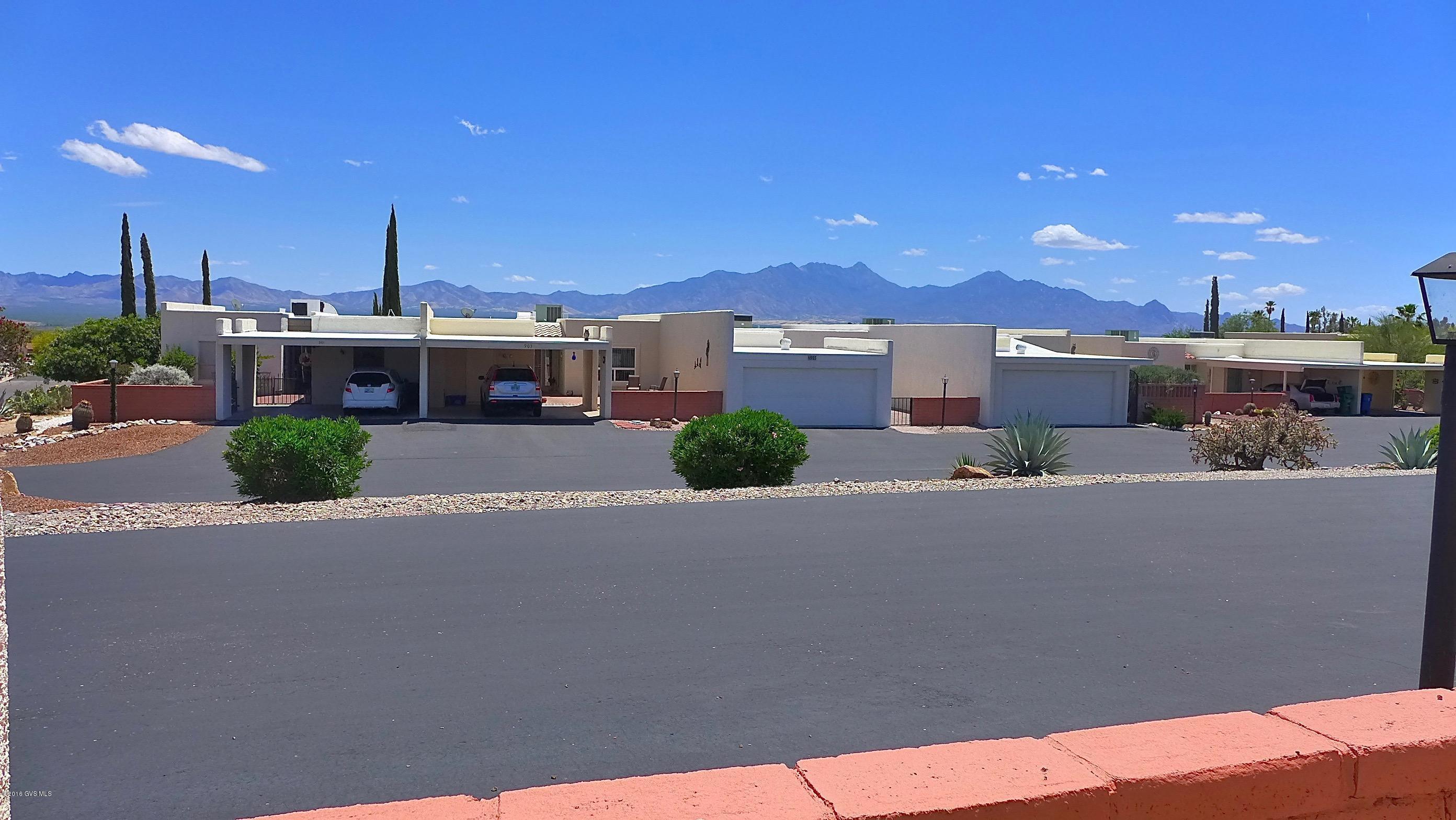 Million dollar views for less than $100,000! The large front courtyard provides front row seats to the magnificent and ever-changing Santa Ritas. Inside you will find a fully furnished home that has a freshly painted interior which beautifully maintained. The updated bathroom has a lovely tiled shower/tub enclosure. The backyard backs to a big common area and offers a quiet and tranquil setting. Easy care landscaping means you'll have plenty of time to enjoy all the amenities that Green Valley offers.