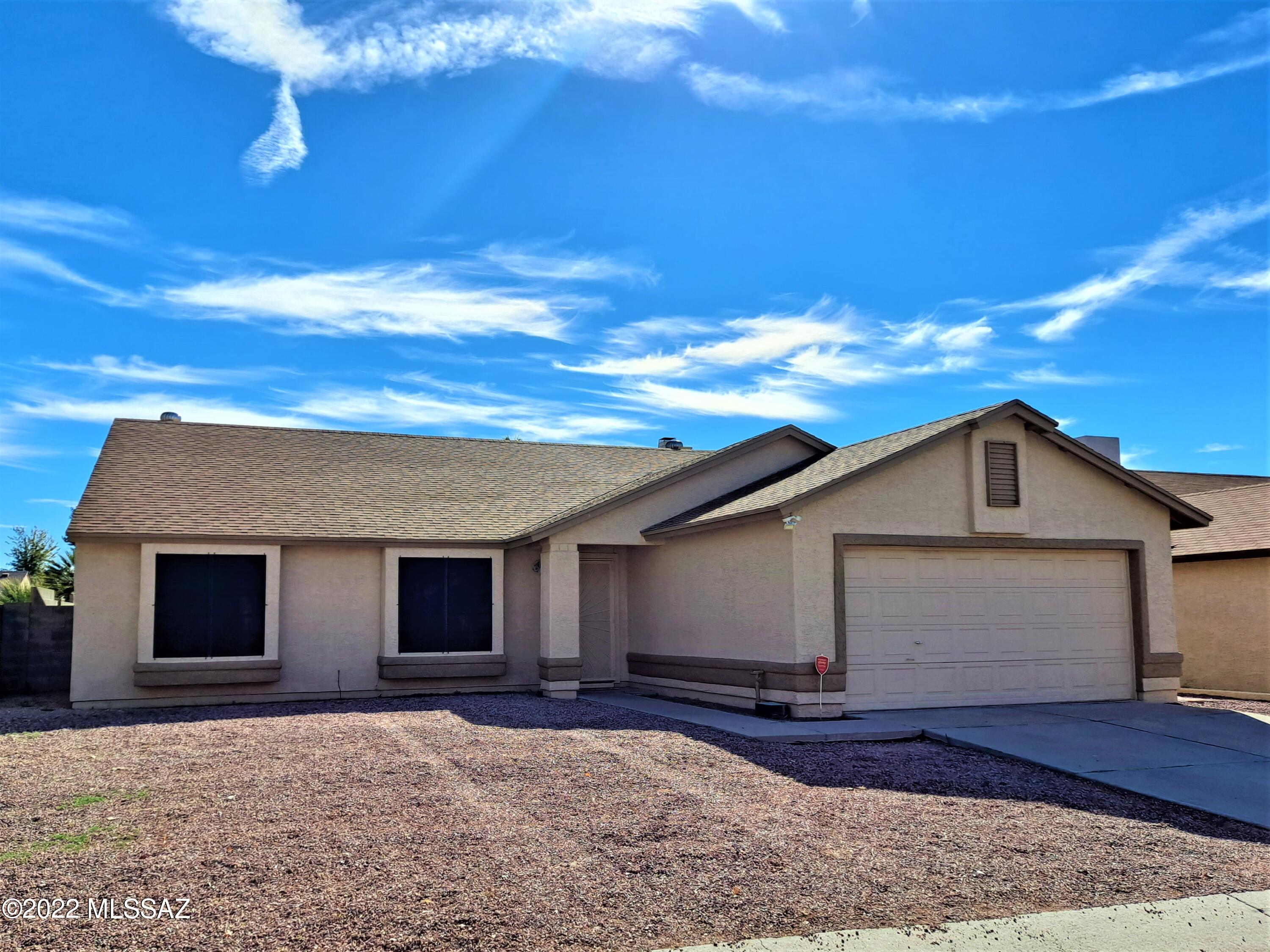 Tastefully updated house, in great neighborhood.  This beauty has tile throughout, with carpet in the bedrooms.  Stainless steel appliances in kitchen.  Granite counter tops in kitchen and both bathrooms.  Bathrooms have updated shower and shower / tub surrounds.  There is a gas fireplace in family room.  Back yard is great for entertaining, with large, covered patio and swimming pool for the incredible Arizona summers.  Polybutylene plumbing has been replaced.  This is what you have been waiting for, don't hesitate.  Make a move today.  Make this great find your home.
