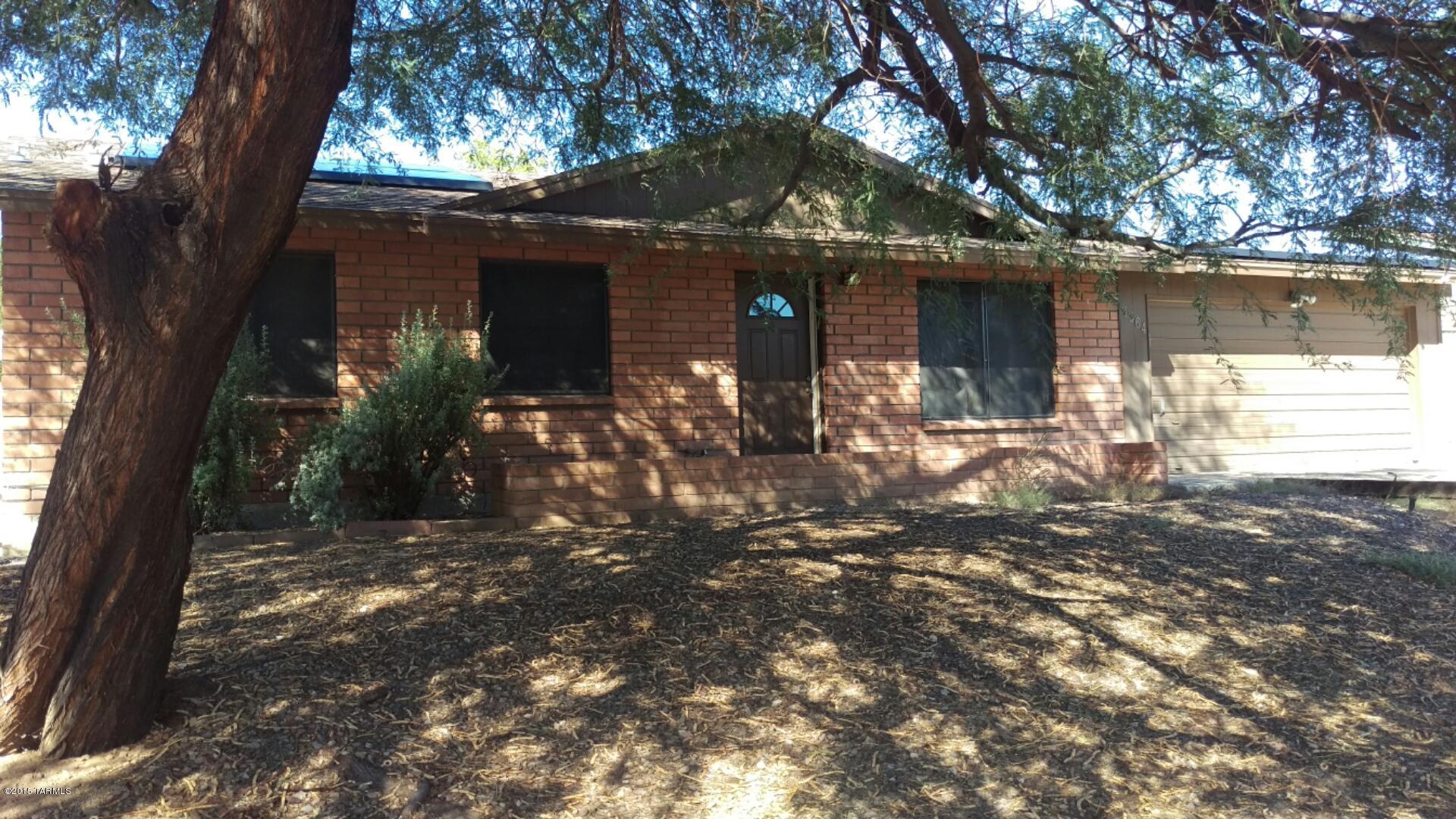 Highly Desirable Brick Home on an Oversized Pool Lot with Endless Opportunity. Features Include: Ceramic Tile, Ceiling Fans, Oversized Pantry, Updated Bathrooms with Tile Surrounds, Extra Storage Room, Gas Dryer Hook Up in the Garage, Double Side Gate, Full Length Covered Patio & More! HURRY- PRICED TO SELL!