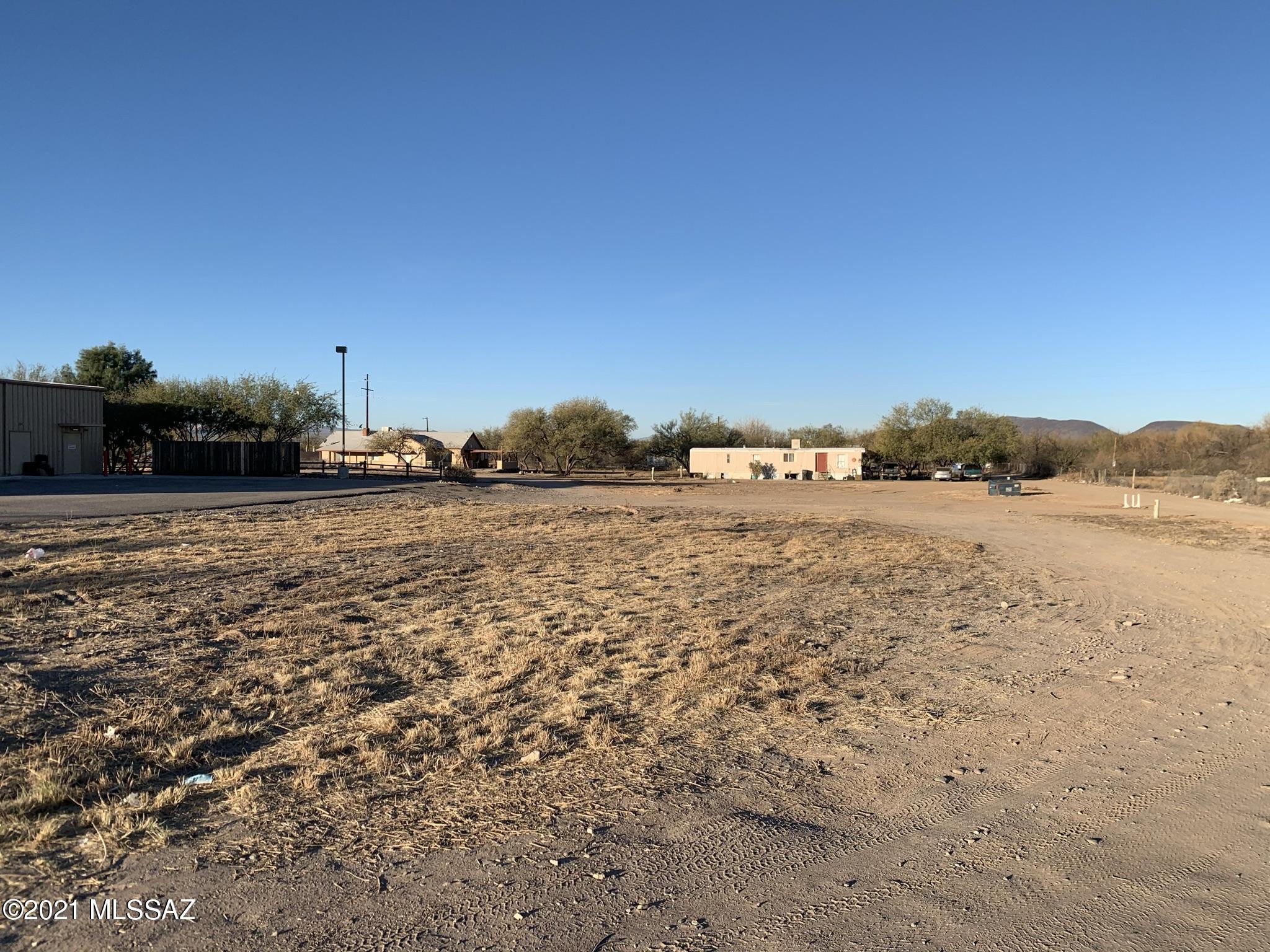 SELLER WILL CARRY FINANCING! Nearly an acre of vacant land with Nogales Hwy frontage - already zoned!! Tucson CB-1 lot provides an excellent opportunity to take advantage of traffic count from the highway and the Family Dollar store. CB-1 offers a wide range of uses. Hold for future investment or build from the ground up. Property with the zoning in place is hard to come by, so don't miss out.