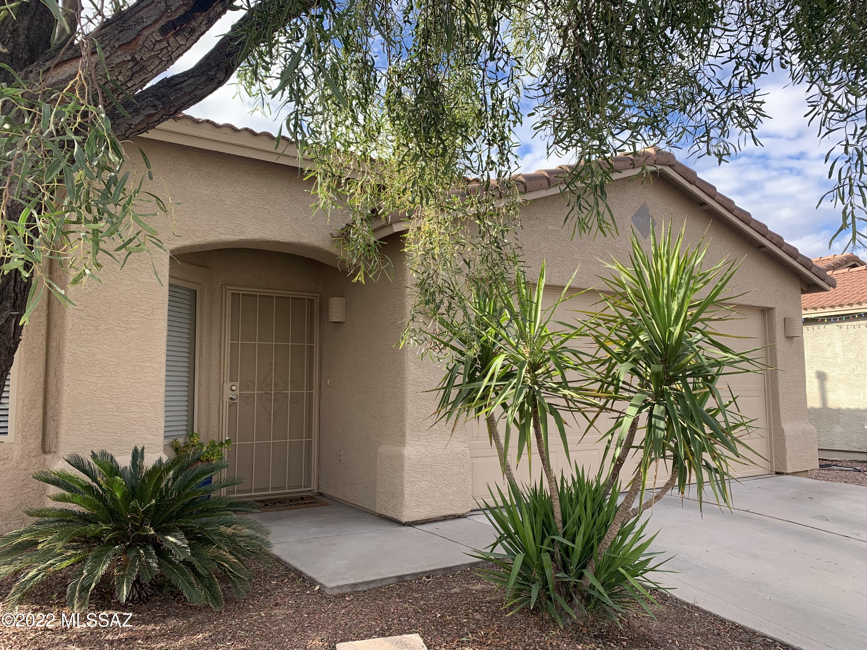 Range pricing. Will entertain offers from $340k-$360k.  Immaculate home ready for it's new owner. Entire home was renovated within the past 2 yrs. Fresh paint interior and exterior, granite countertops in kitchen and bathrooms, tile and very new carpet in LR & 2 brs, up-graded lighting fixtures and fans. Remodeled bathrooms with beautiful glass basins, classy mirrors and light fixtures. Recessed lighting with dimmers in LR and Greatroom,. Irrigation replaced in back yard. Relax in your private patio or invite your guests to a beautiful evening or cookout. Close to I-10, hospitals and shopping.  Hiking trails & Tumamoc Hill just minutes away. Bike trails in close proximity to and all along the Santa Cruz River.  You'll love coming home to this quiet home & neighborhood.
