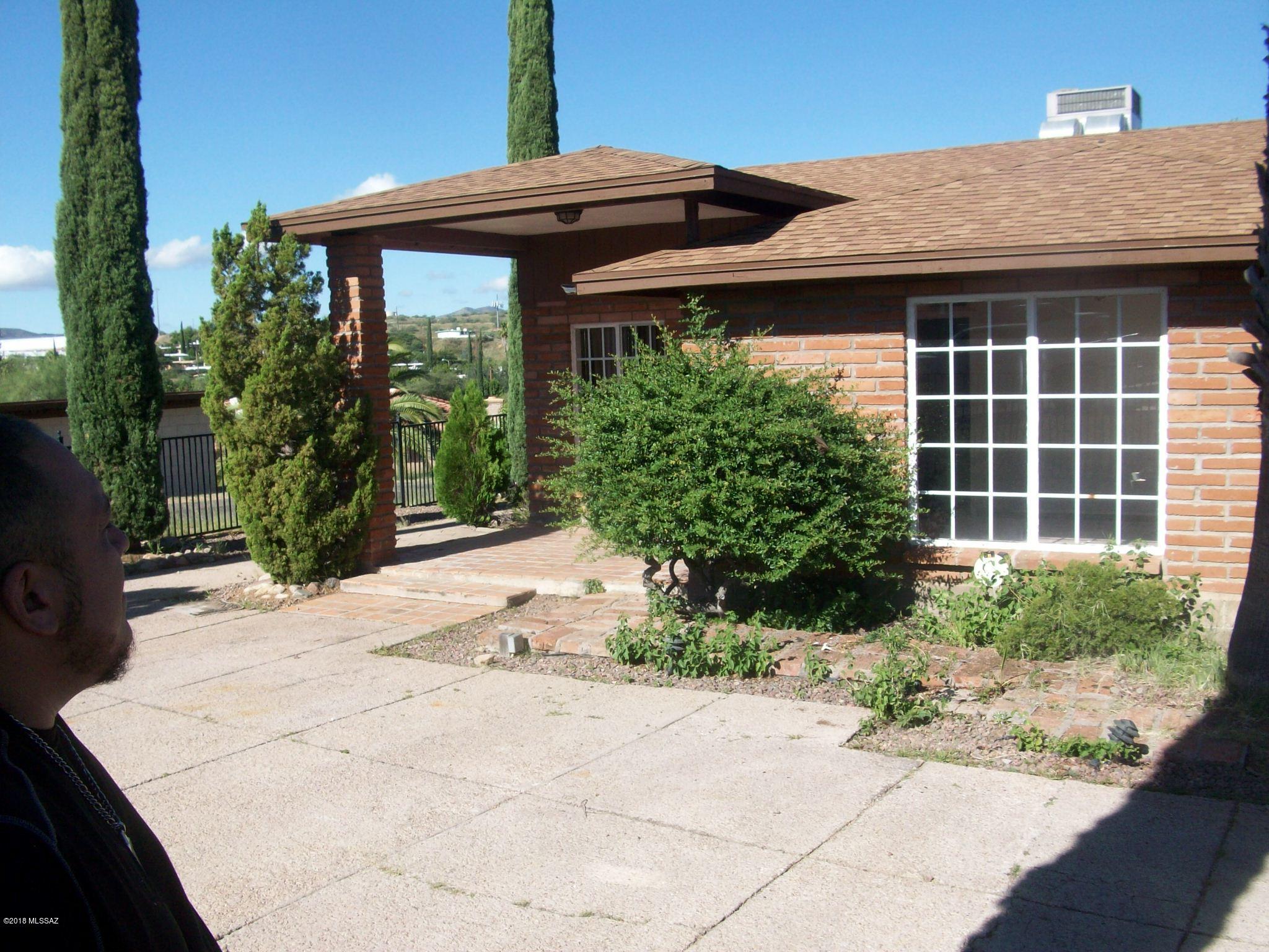 Almost an acre - views - Single family detached home - 2013 sq ft all brick, built in 1991 - also (permitted) 629 sq ft casita/patio in the back yard for those evening of views - also massive storage and a separate storage building - - Needs some updating and deferred maintenance - new roof just installed on both buildings - Solid all brick property.