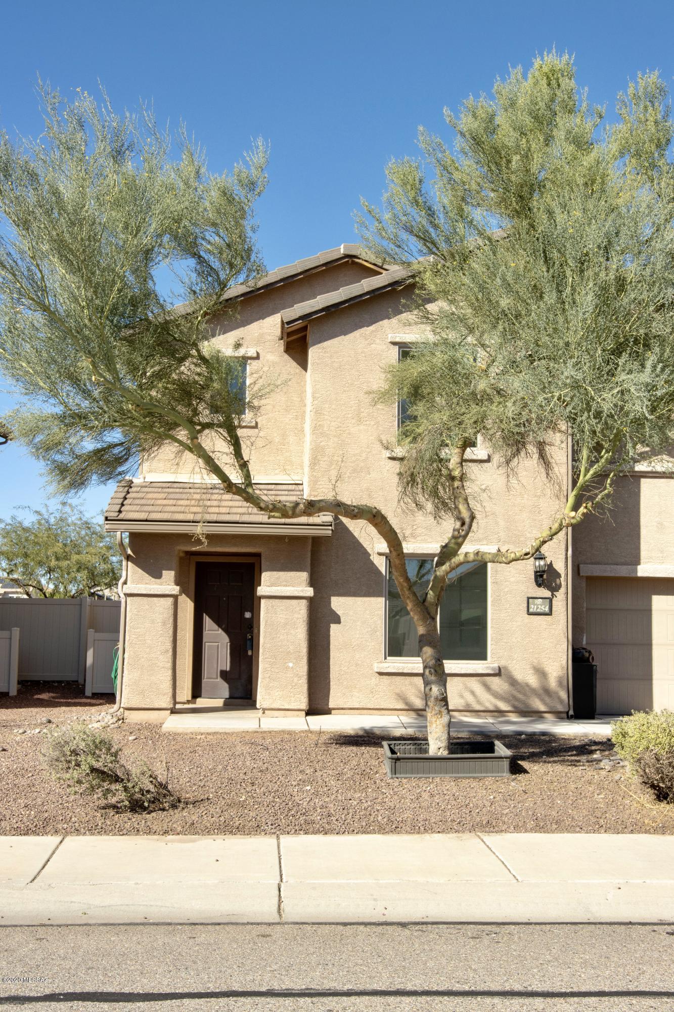 Perfect 2 story family home! This 4 bedroom 2.5 bath home is perfect for any size family. BRAND NEW carpet. Beautiful tile throughout. NEW HVAC installed a couple weeks ago. Red Rock Village is a wonderful community with many amenities: basketball/ sports fields, pool. It is a must see this will not last long.