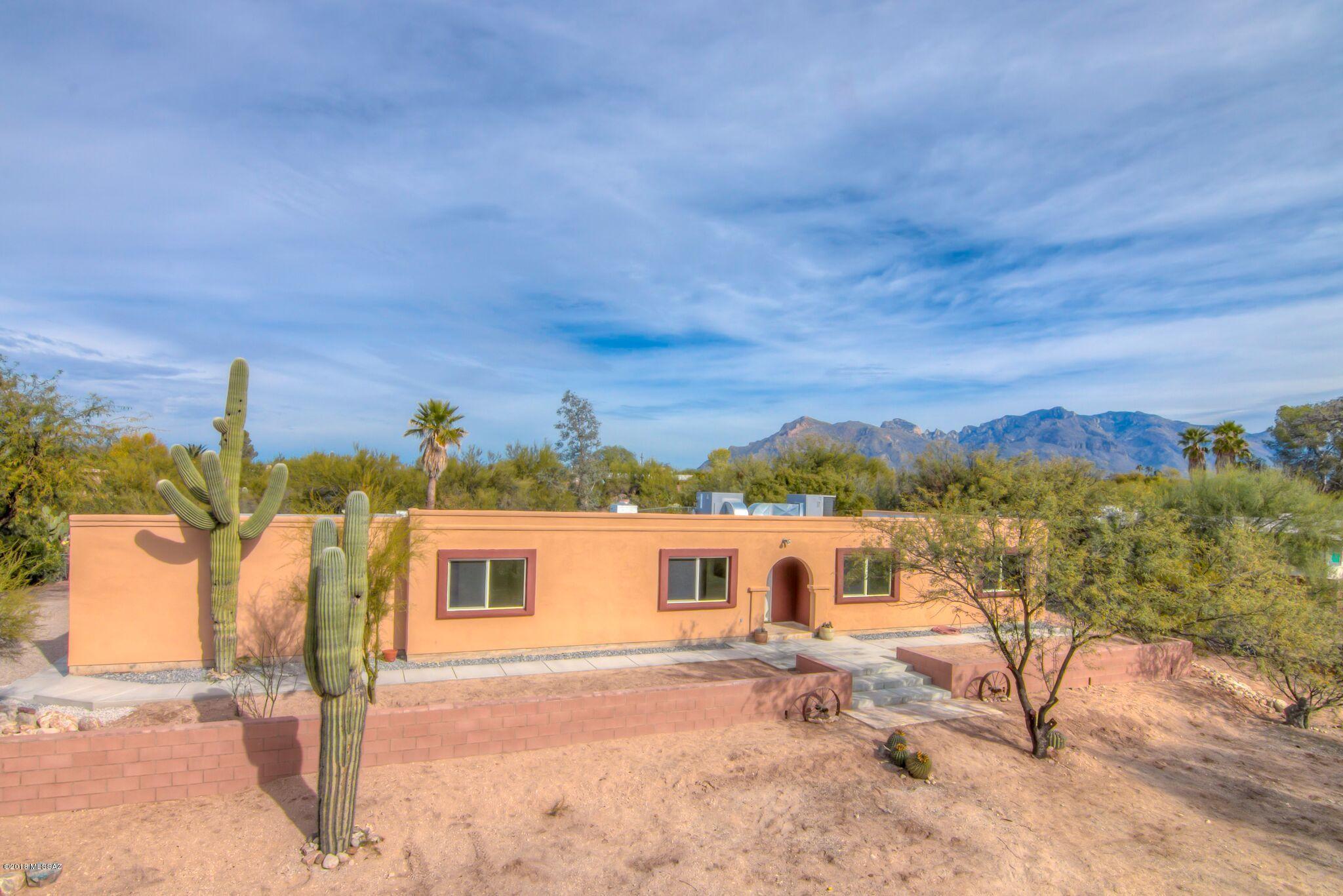 ALMOST TOTAL REMODEL OF THIS WELL LOCATED RANCH ON NEARLY AN ACRE. 4 BED PLUS SPACIOUS BONUS RM & 3 BATHS MAKE THIS HOME A TREMENDOUS VALUE! POOL HAS BEEN REPLASTERED AND POOL DECK REFINISHED. BRAND NEW POOL EQUIPMENT.  NEW CERAMIC TILE FLOORS IN BEAUTIFUL NEUTRAL COLOR COORDINATE PERFECTLY WITH NEW KITCHEN CABINETS AND STAINLESS STEEL APPLIANCES.  HOME HAS  NEW STUCCO WORK AND FRESH PAINT. NEW DUAL PANE WINDOWS, SLIDER, AND ALL NEW DOORS. UPDATED LIGHTING. NEW MASTER BATH CONVERSION AND NEW DUAL VANITY IN HALL BATH. BONUS ROOM HAS REFINISHED FLOORS AND NEW WINDOWS. NEWLY CONSTRUCTED RETAINING WALL AT FRONT AND NEWLY TILED ENTRY. AS IF ALL THIS IS NOT ENOUGH, CONSIDER THAT HOME WAS RE-ROOFED IN 2018 AND HAS NEW HVAC.
VIRTUALLY NOTHING TO DO TO THIS SOLID ADOBE HOME BUT TO MOVE IN & ENJOY!