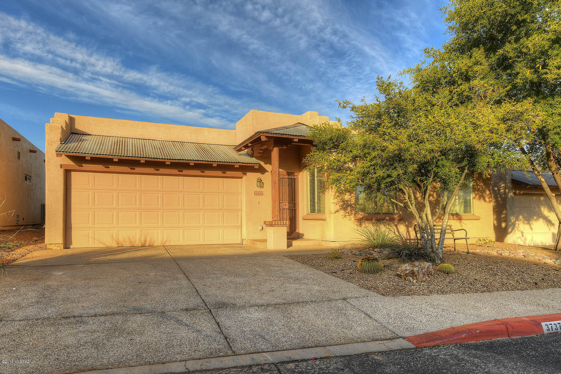 Charming Santa Fe in quality built Crest Ranch Subdivision. Privacy and convenience perfectly located in close range to community pool. @Campbell/1/4 mi W on Prince. Open GREAT ROOM floorplan w/gas fireplace. Scored concrete floors, newer carpet bedrooms, all appliances, Split bedroom plan. Master Suite w/garden tub/shower/dual sinks, tile counters and walk in closet. 2 other bedrooms/hall bath. Covered patio, easy care walled yard.  Easy commute UA or UMC-bike route /UA Shuttle@Prince/Mountain. Close to St. Phillips Plaza and Campbell corridor conveniences.
