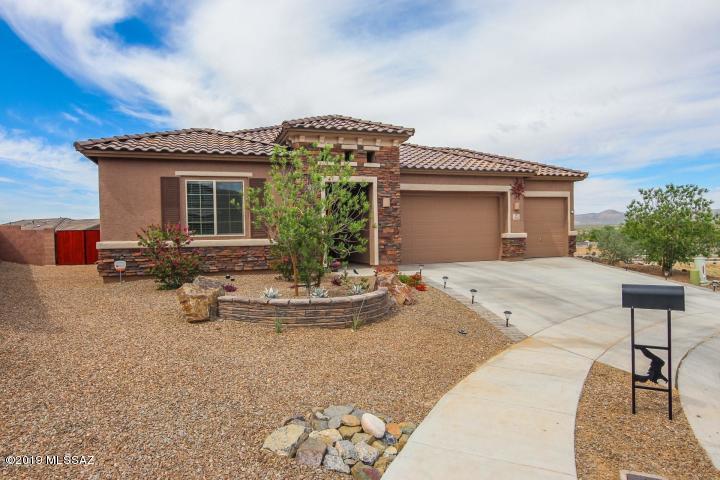 VIEWS! VIEWS! VIEWS! on one of the largest lots in Eagle Crest! 3 Bed/2 Bath + Den & 3 Car Garage w/ a 220 service! Open Floor Plan! Recent kitchen UPGRADES include Quartz Countertops, Granite Sink, Paint & Lighting! Extra Large Kitchen opens to Great Room with Flush Ceiling Speaker Surround Sound. Spacious Office/Den with Glass French Doors. Large Master Bedroom Retreat. Large guest rooms w/walk in closets! Well maintained Rainsoft Water System & Laundry System & LED Lighting. Garage lovers dream-- custom paint w/high tech opener. Pool installed in May, 2019. Gazebo is ready to protect you from the rain while you watch the monsoons for miles!