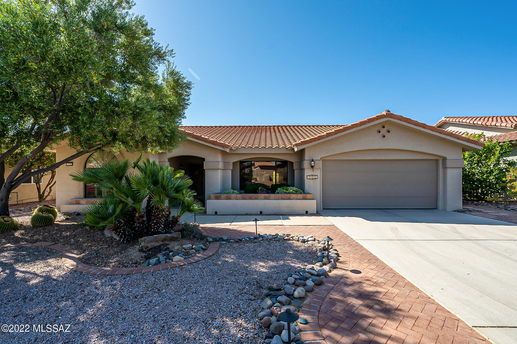 One of the most amazing view lots in Sun City, both golf course and panoramic east facing Catalina Mountain Views. Expanded Pacifica model with newer HVAC system, 2018, and newer hot water heater 2020. Silestone counter tops, newer microwave & dishwasher. The deep covered elevated private backyard patio is where you will enjoy both the moonrise, the mountains turning pink and desert sunrises.  The soft green color from the golf course, the stars at night and the quiet evenings are so soothing! This is it, a home with an amazing view that will never go away!