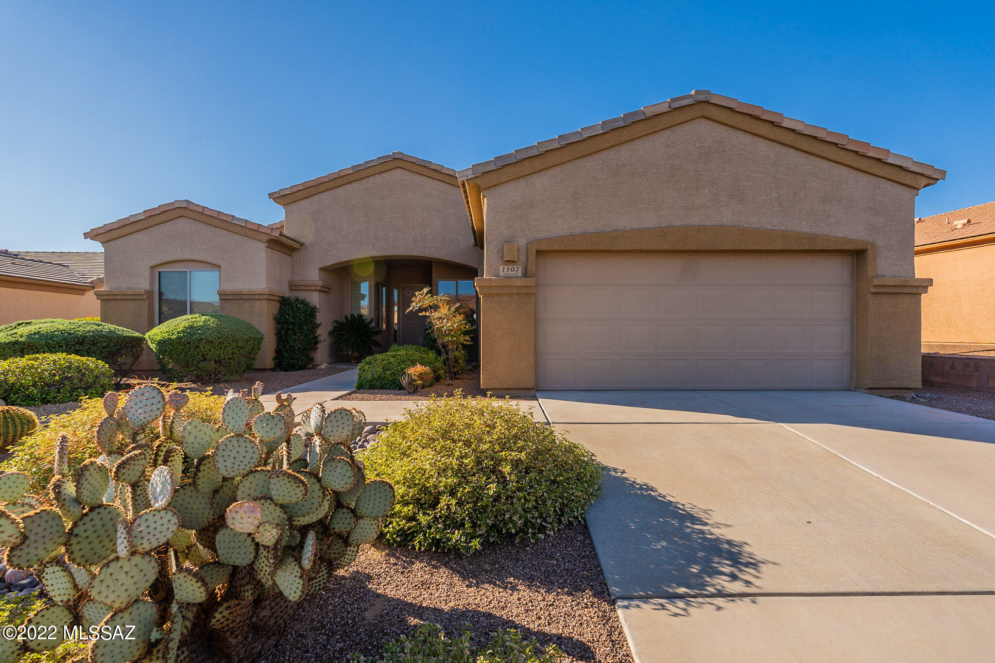Come out and see this 1678sqft home that features two bedrooms and two full bathrooms. Tile throughout most of the home. Comfy carpet in the bedrooms, den and living room. Prepare a gourmet meal in the Kitchen then cozy up in the living room next to the fireplace. The Main bedroom suite houses a large picture window, dual vanities and a door that leads right into the backyard. From
this lot you will enjoy the Santa Rita mountains. Come out and see this home today. **Washer, Dryer and Refrigerator will convey with the home.**
