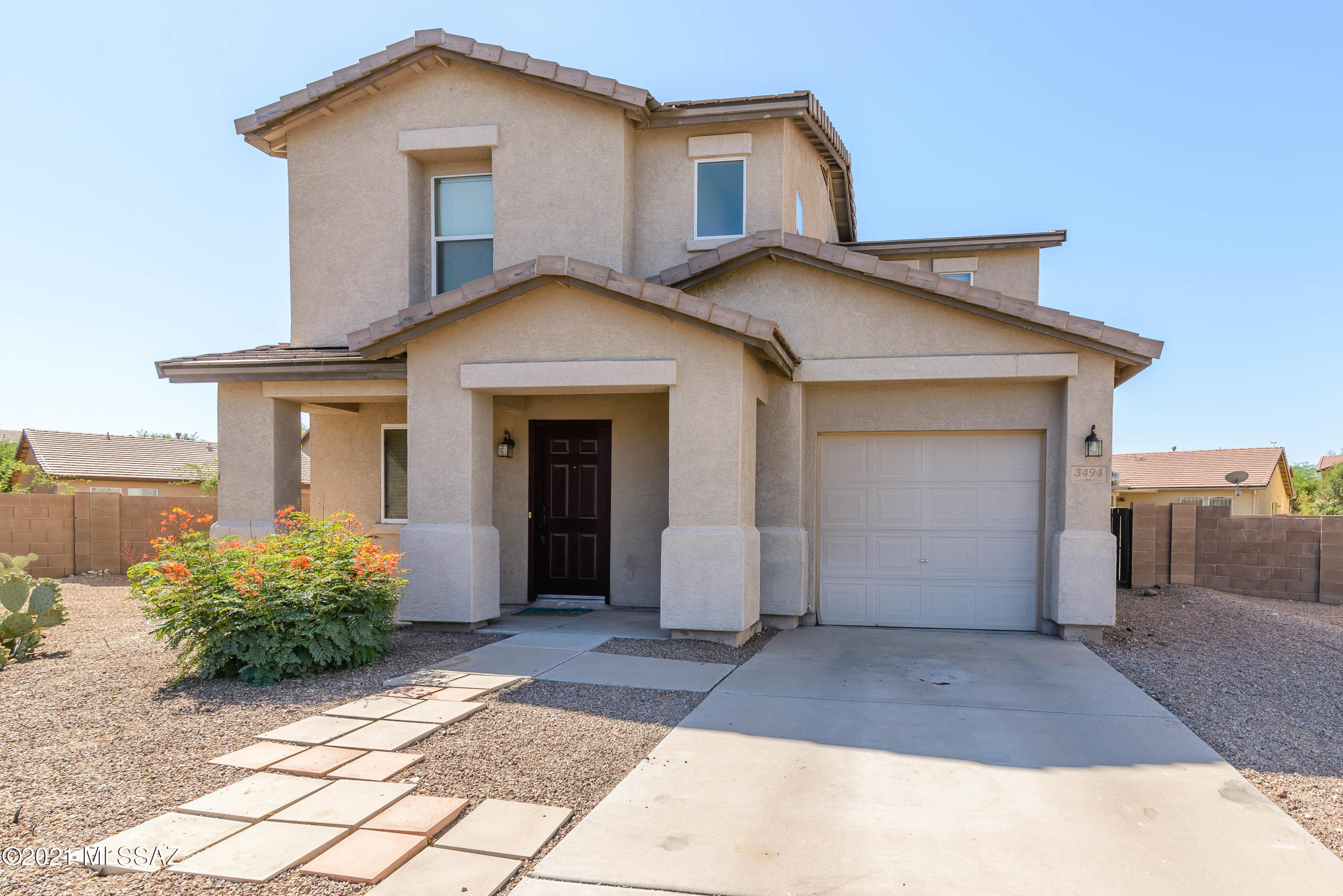 Great home Great Location. Huge back yard with covered patio. Open floor plan and ceiling fans throughout, Close to the Rilito River Walk. Easy drive to the U of A and Banner Medical Center. Don't wait on this move in ready home!
