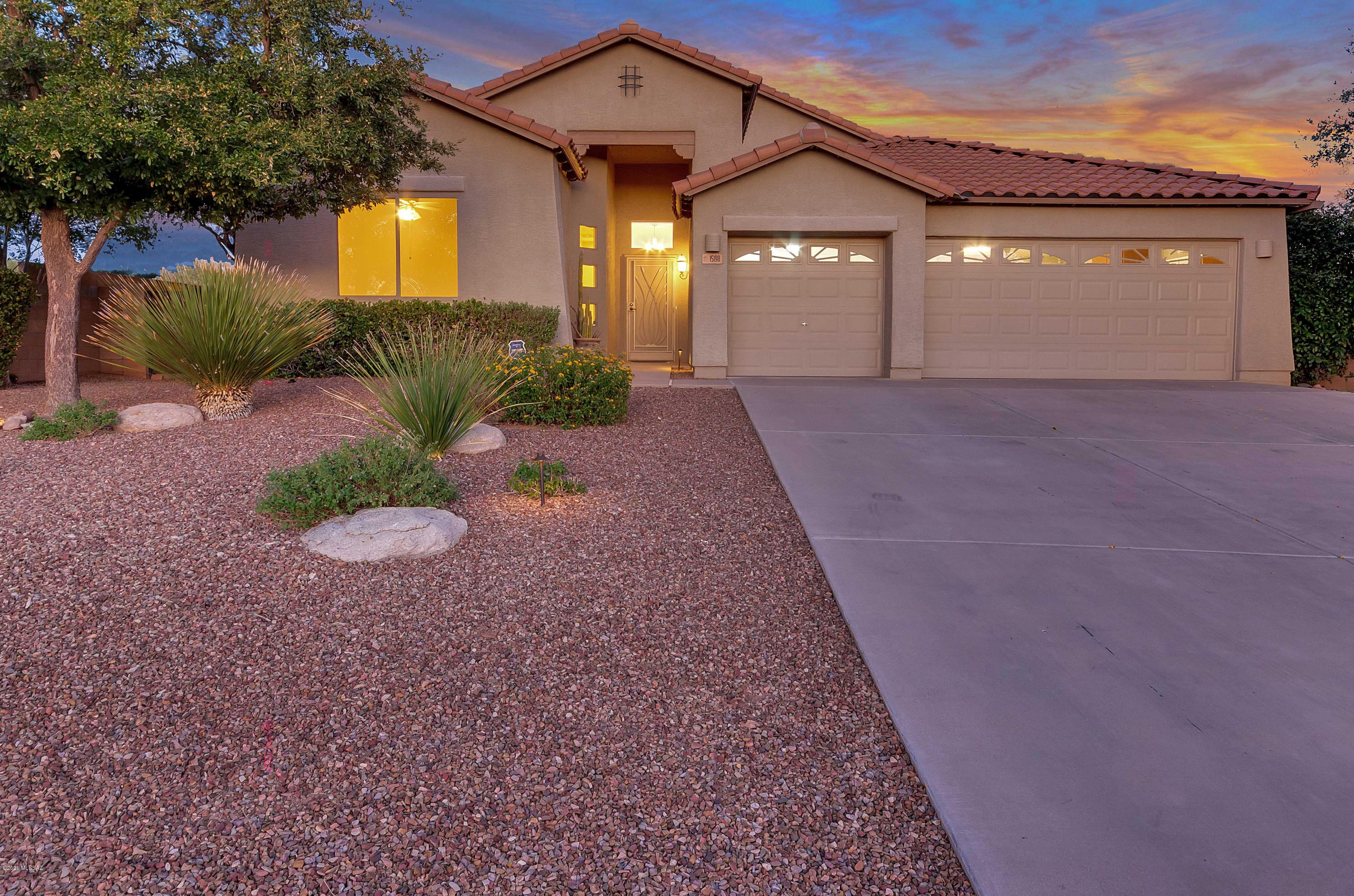 ENJOY THE AMAZING MOUNTAIN VIEWS in a RESORT LIKE SETTING, PLENTY OF ROOM FOR A CUSTOM POOL & OR CASITA, fully landscaped w/professional lighting, a custom waterfall fountain & pond and a built in BBQ!!!  Hugh BACKYARD IS ADJACENT TO COMMON AREA & OPEN SPACE AS FAR AS THE EYE CAN SEE! This FOUR (4) bedroom home is located on one of the LARGEST (ALMOST 1/2 ACRE) & PRIVATE  lot in the subdivision.  This one owner home has been meticulously cared for and the interior has been recently painted and a 5-ton, 16 SEER Carrier HVAC system was installed in April 2018. There are plenty of upgraded cabinets & countertops in the open kitchen with a raised breakfast bar island. The SPACIOUS THREE CAR garage has cabinets for storage, utility sink and service door. This is a family friendly neighborhood.