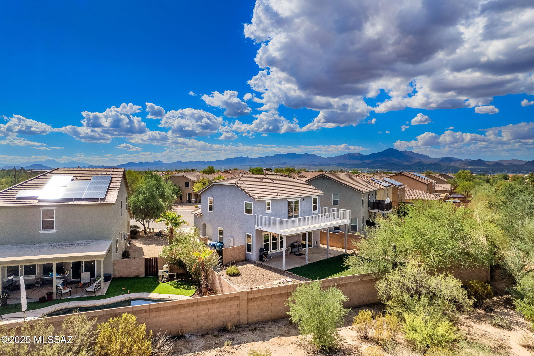 Wake up to desert Tortolita Mountain views, enjoy coffee on your balcony, and hop on the trail for a morning bike ride or a run. Well maintained 4-bed, 2.5-bath home on a quiet cul-de-sac with no rear neighbors. Step inside to a bright, open living & dining area filled with natural light, perfect for entertaining. The spacious kitchen features plenty of counter space, updated cabinetry, and modern appliances. Upstairs, unwind on your fully remodeled balcony overlooking amazing Tortolita Mountains. Whole-home water softener is installed for added comfort. Low-maintenance backyard is ideal for outdoor living, also perfect for relaxing or hosting. Just minutes to Arthur Pack Park, golf course, & hiking trail! This home is peaceful, private, & ready to enjoy!