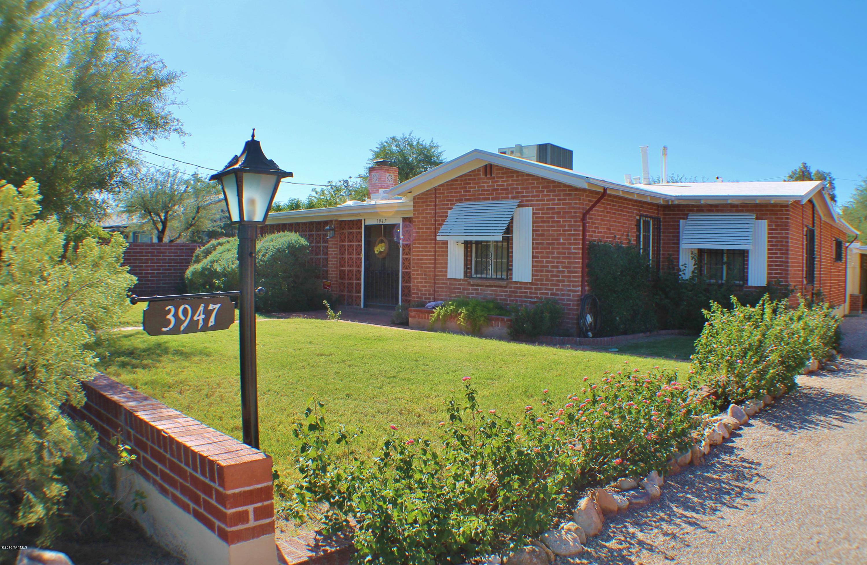 Range pricing-Seller accepts/counters offers  $150,000-165,000. PAMPERED, SPECIAL, RED BRICK CUSTOM HOME -- ORIGINAL OWNER! This central showplace offers plantation shutters, wood-beamed ceilings, wrought iron security and 2 brick fireplaces! You'll enjoy the split bedroom plan, plus extra room for office, crafts or nursery. Oversized back yard with covered patio, built in BBQ, 2 storage sheds, 2 carports and  garage/workshop.ROOF ONE YEAR NEW- AC new in 2005,per owner!  Walk to everything- shopping, bus, restaurants.
MUCH MORE!