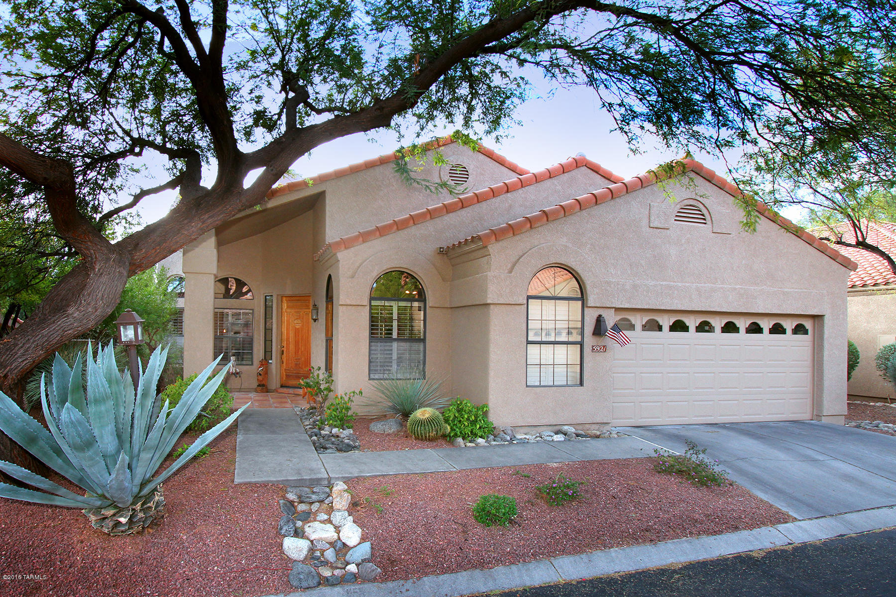 Luxury gated community, exceptional location and a golf villa privately situated on a beautiful vegetated lot backing to the 11th green of Ventana Canyon's prestigious golf course! 2BR PLUS den southwestern home features plantation shutters, granite kitchen w/breakfast nook & over-sized garage with storage cabinets. Entry leads to the dining rm & great rm of this captivating home featuring light bright spaces, split floor-plan & vaulted ceilings! Plenty of space for game table, bar or extra seating! Discover inviting den/office w/double drs & a guest bedroom friends will cherish.  Private master ste offers tranquil living, french dr to over-sized patio & lush landscaping. Join the country club-social, tennis and Golf. Just minutes to Sabino Cyn National Park, restaurants & shopping!