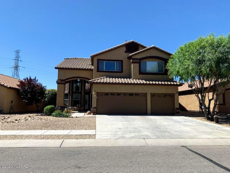 Here's a beautiful 3 bedroom, plus a den and a loft, with a 3 car garage former model home. You'll love the grand entrance and staircase, new paint, water softener, nicely painted kitchen cabinets, upgraded counter tops, and high end stainless steel appliances. Outside you'll be ready to entertain, with no rear neighbors, fully landscaped front and backyards, and a built in BBQ out back. You can also enjoy the sunsets from your private master balcony. Only two houses from the cul-de-sac, so it's great for privacy and playing outside. Located close to the north satellite pool and park, easy access to the freeway, and all the amazing amenities that the award winning community of Rancho Sahuarita has to offer. 3D Virtual Tour Available below:
https://my.matterport.com/show/?m=bdgUUc8L2oi