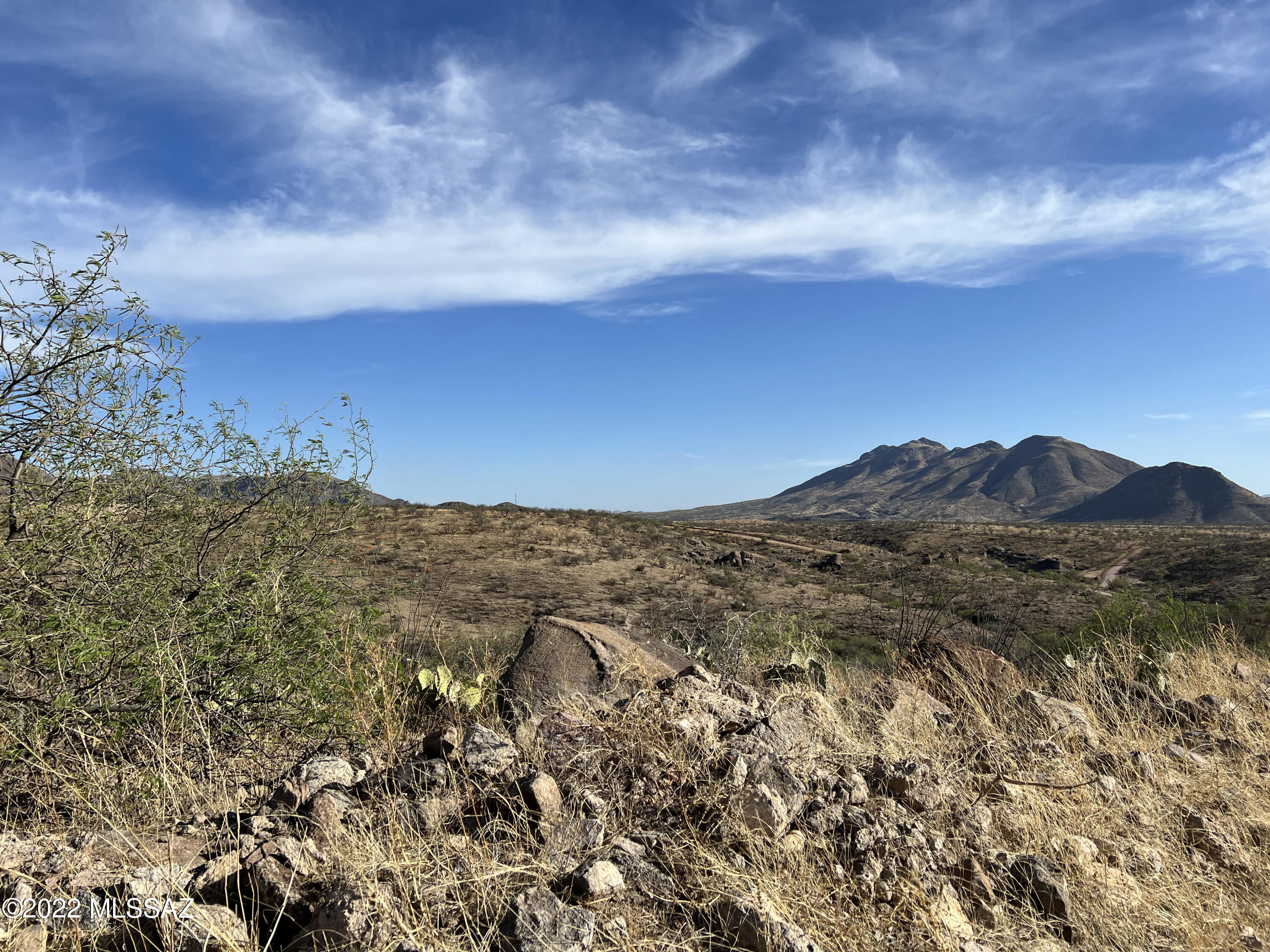 Tubac Foothills Ranch property with good access. A well and septic is needed so you can enjoy the privacy and panoramic views when you build your forever home! Tubac Foothills Ranch is on the east side of Tubac and the Santa Cruz River. It is pleasantly
secluded, snuggled into the foothills of the Santa Rita and San Cayetano Mountains. Home sites are at least 7 to 36 acre parcels and include power and bladed roads to all parcels. Private septic systems handle waste, and water is via private wells accessing an aquifer noted for outstanding purity for all residential needs. Face any point on the compass in this very special enclave and you'll see the great vistas: cinematic views of mountains, sunsets, beautiful hills and valleys, and rock formations.