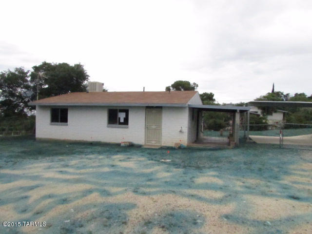 HUD Home. Save thousands. Enjoy small town lifestyle and cooler temperatures that Oracle offers. Rare opportunity. Great value at a modest price. Affordable living for the budget minded. 2 car carport, large storage/workshop. This is a must see.  Note buyers will be responsible for utility turn-on and any required permits for utility connection fee. Buyer to verify all info.   Per FHA appraiser year built is 2003. Price reduced.