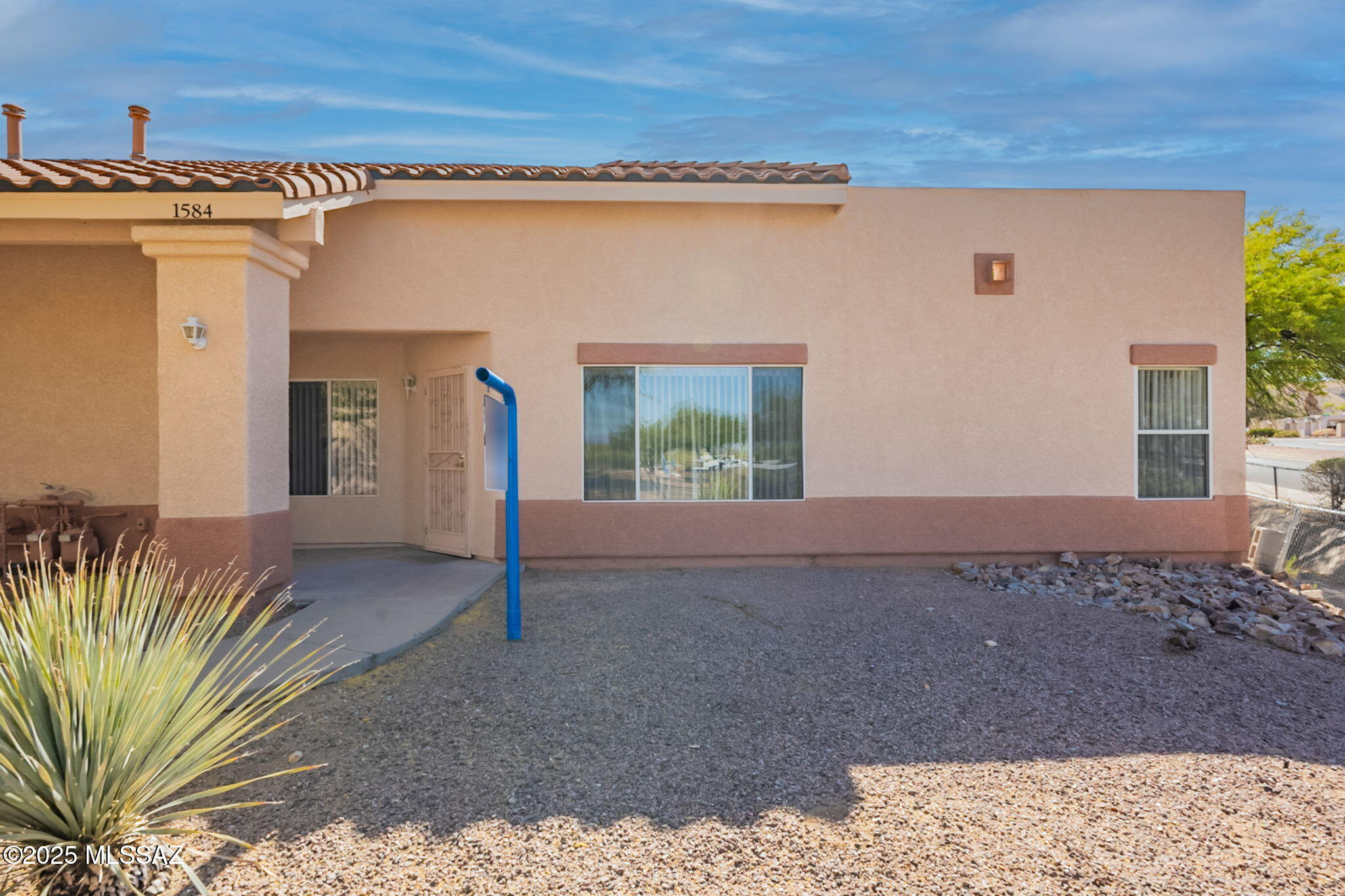 This is the perfect first time home, investment property or winter getaway! NO GVR but available! Open floor plan has 9' ceilings and oversized windows to let in loads of natural light. Kitchen has breakfast bar and separate dining aThis is the perfect starter home, investment property or rea which opens up to spacious covered back patio, adding extra living space.  Large master suite with walk-in closet. Guest bedroom also has a walk in closet and own bath. Laundry located in oversized 2nd bath. Community Pool with spectacular views of the Santa Rita Mountains! Centrally located easy highway access, walk to farmers market and rec centers!