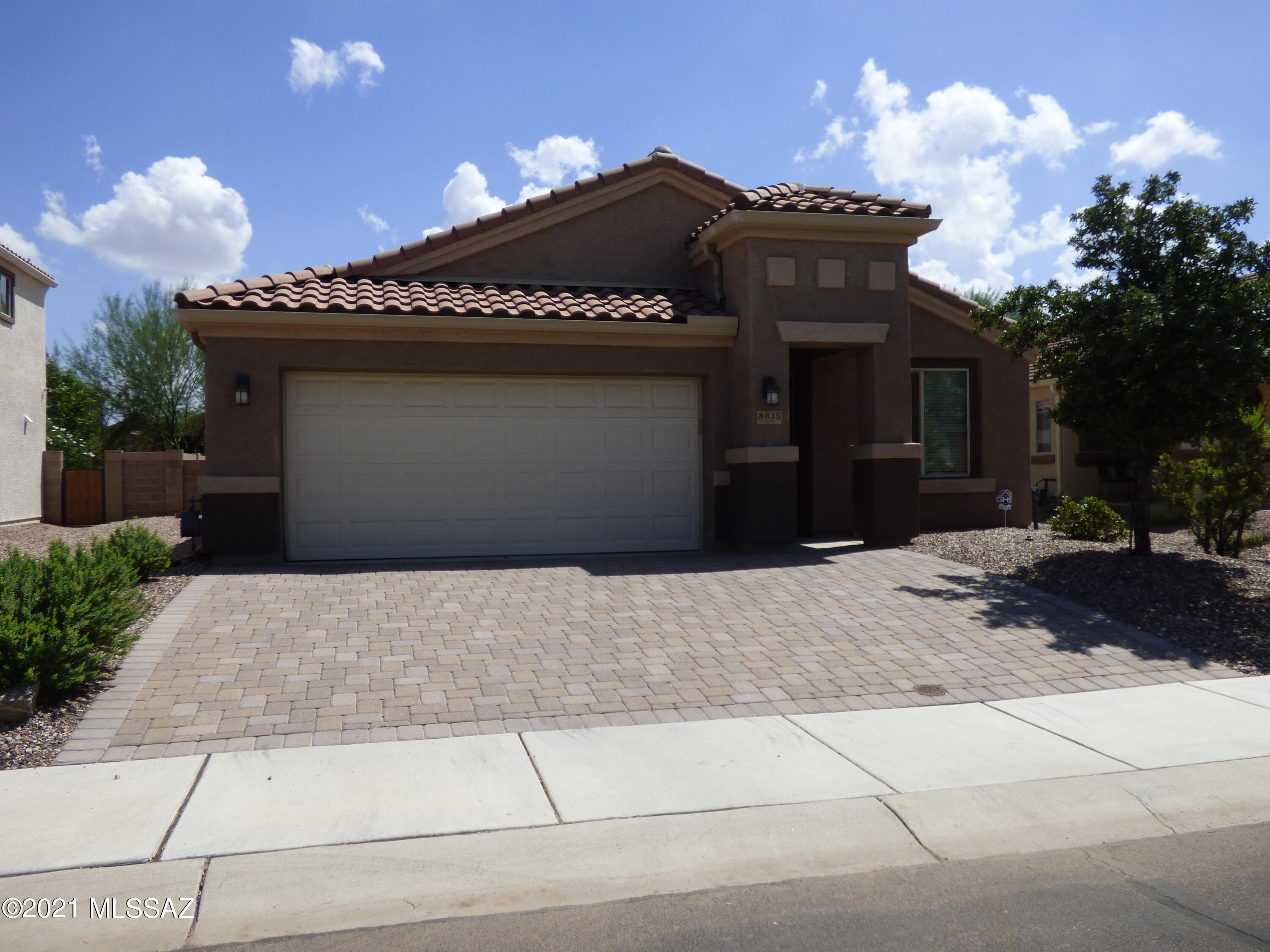 BEAUTIFUL 4 BEDROOM AND DEN WITH OPEN FLOOR PLAN IN WEST MARANA'S SAGUARO BLOOM! TILE FLOORING IN MAIN AREAS, CARPET IN BEDROOMS/DEN, KITCHEN HAS SS APPLIANCES, VERY NICE WOOD CABINETS AND CENTER ISLAND. LARGE LAUNDRY ROOM WITH SHELVING, FORMAL DINING AREA, FRENCH DOOR IN GREAT ROOM OPENS TO THE COVERED PATIO. PEACEFUL BACKYARD SETTING WITH WATER FOUNTAIN, FIREPIT AND ARTIFICIAL TURF FOR YOUR ENJOYMENT. DON'T MISS THIS BEAUTIFUL HOME IN A GREAT COMMUNITY WITH MANY AMENITIES!