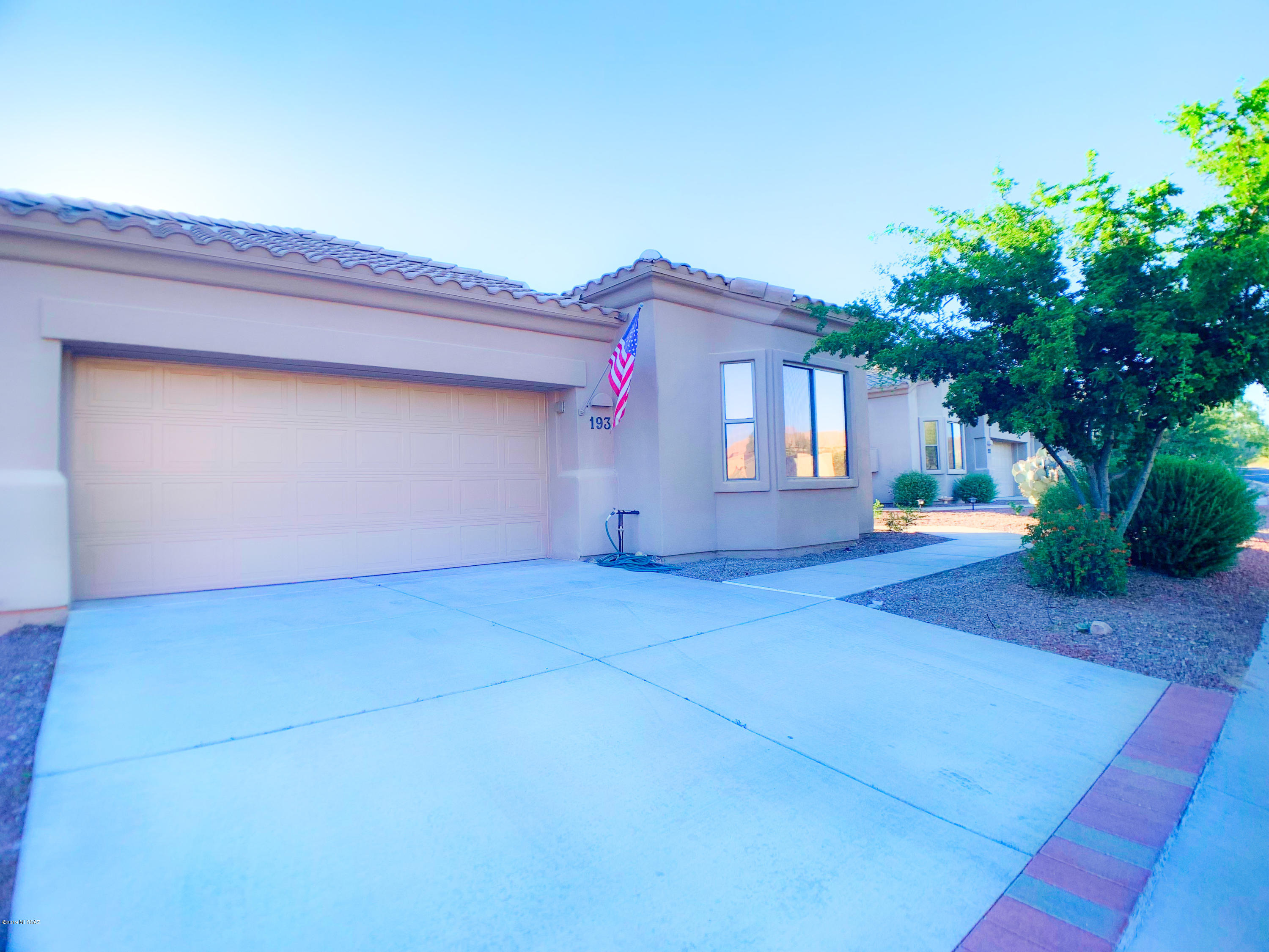 Move-in Ready Buena Vista within gated, age restricted Oro Valley Community. This 2/2, 1516 sqft patio home has an open & flowing floor plan, fireplace & ceiling fans throughout. The 2 car garage has tons of storage, a work area, epoxy floors & A/C! The master suite provides a bay window great for reading, dual bath vanity, & a generous walk-in closet. The guest suite offers a built-in office nook, walk-in closet & private bath. Beautifully updated kitchen has granite counters, upgraded cabinetry, cabinet pulls & an eye-catching backsplash. HOA fee includes water, garbage, sewer, cable, front & back landscaping, pest control, roof, structure ins, ext paint, clubhouse & gate.  HOA amenities include 2 pools, spa, billiard room, gym, library w/wifi, many fun activities & clubs to join.