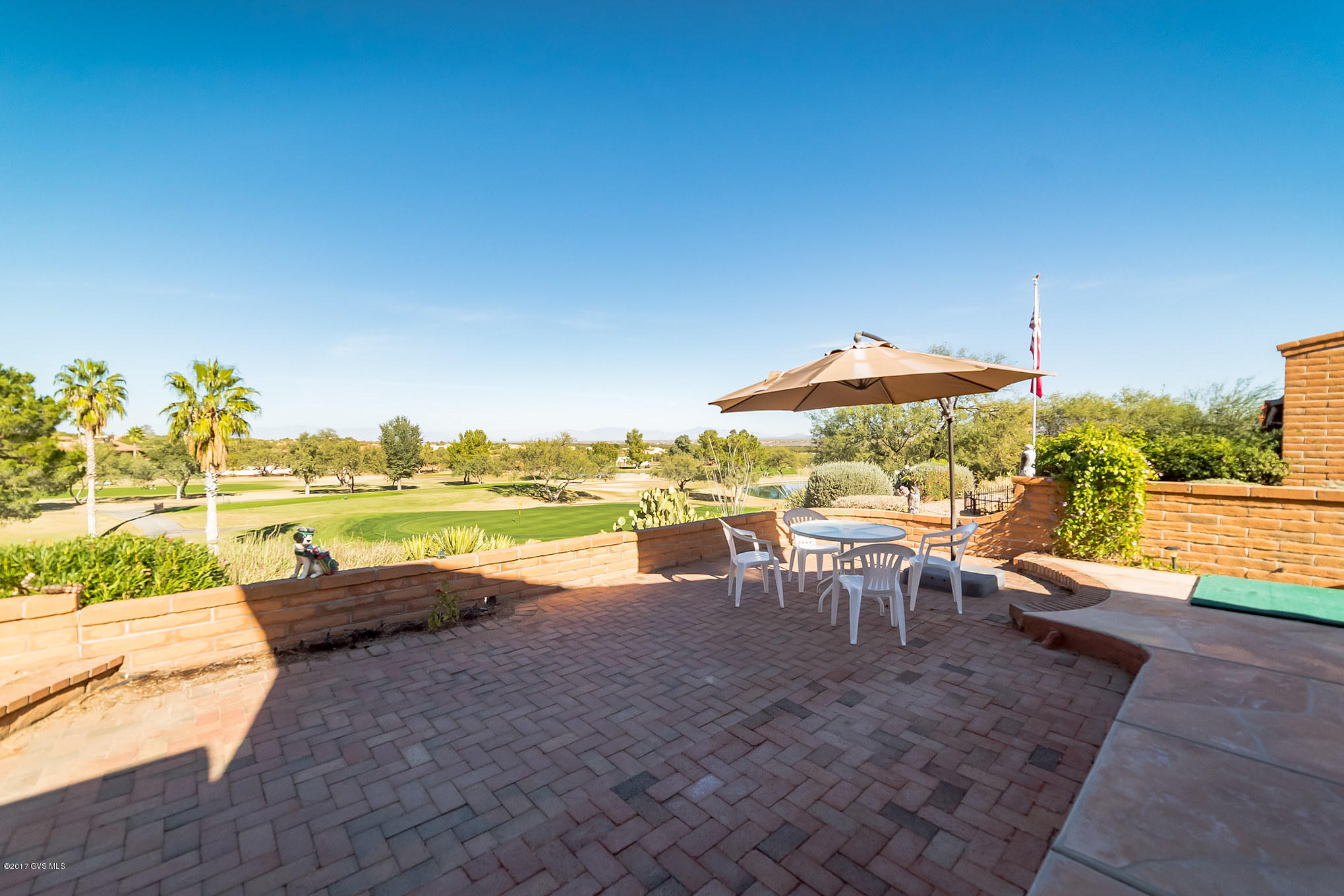 This home's stunning setting, beautiful architecture, & gorgeous outdoor living make it a splended respite from the busy life. Breathtaking golf & panoramic mountain views create a picture perfect hidden gem in the affluent area of Green Valley. This Senita floor plan has been expanded with a bigger office/den and a larger master suite for extra hobby space. The ceiling is raised/vaulted and the den opens up to the living room with a beautiful bee hive fireplace. The master suite has been altered with an added closet and a pocket door to master bathroom for privacy. The bathroom vanity has been raised. Quartz counter tops adorns the kitchen along with a well positioned window that over looks the front entry way. The wrap around porch & spacious patio is ideal for entertaining!