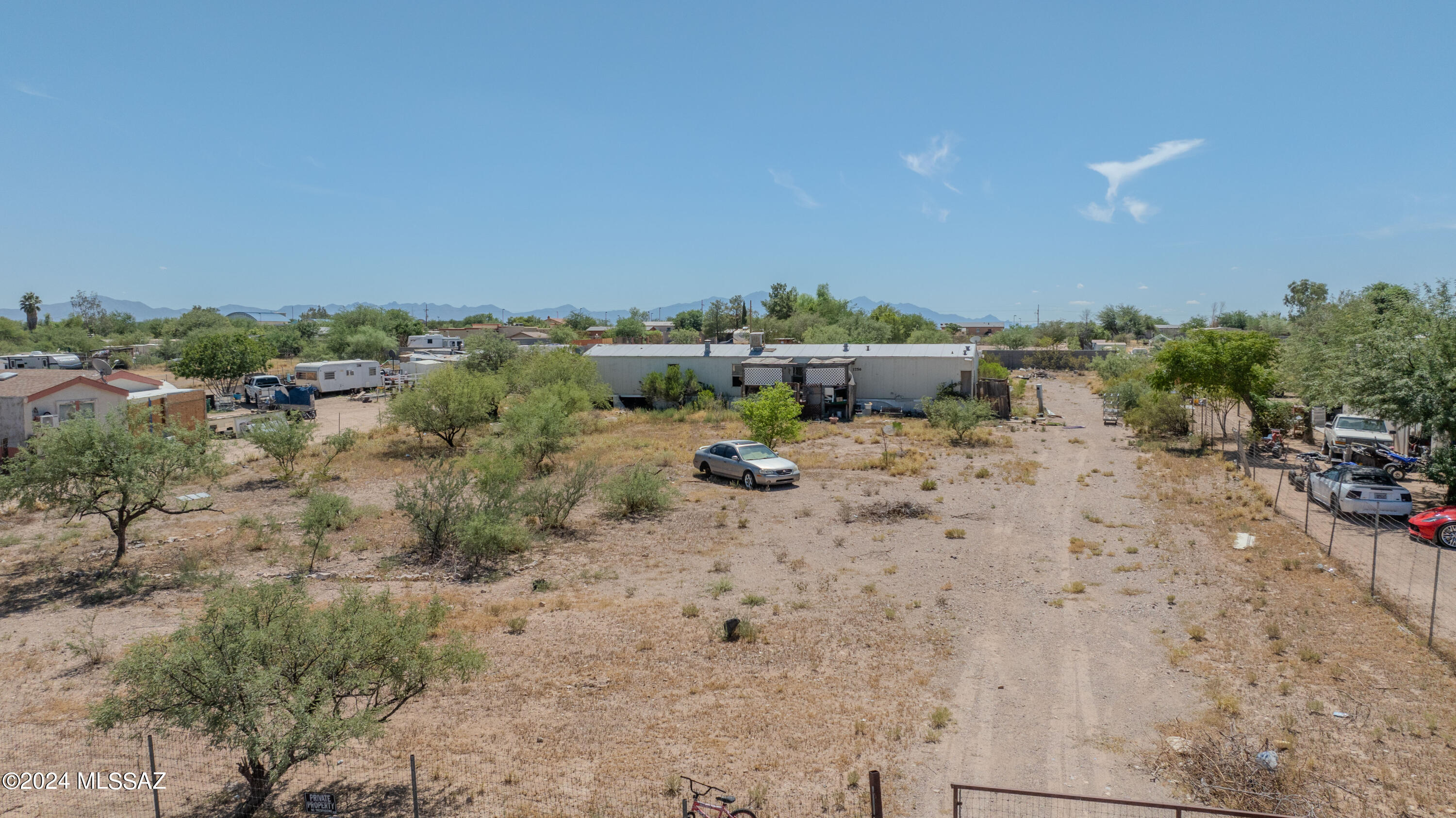 YOUR OWN HORSE ACREAGE IN TUCSON! Enjoy rural living just south of Tucson with this prime acre lot! This vacant land lot is perfect for building your dream home or adding an existing manufactured home. Located just minutes from Old Nogales Hwy you get direct access to Tucson and the Tucson International Airport. You get access to beautiful Sonoran desert views and the peace and quiet of rural living. Utilities and Septic systems are already installed making this a convenient buildable lot. Come see it today!