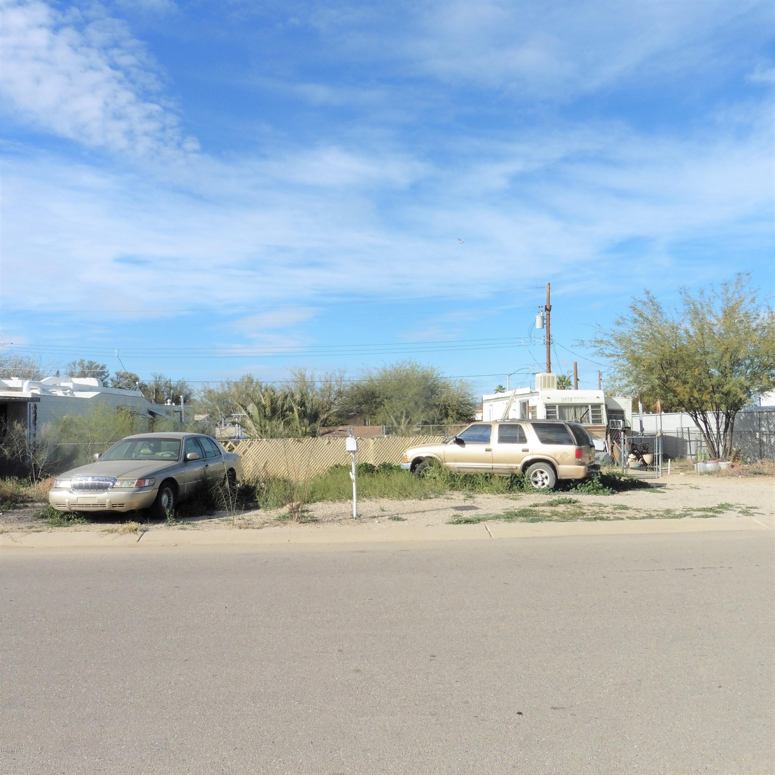 Property sold as vacant land.  There's an easily moved RV on the property owned by a third party.  They pay rent of $365 per month (market value is $400 per month) and they are on a month-to-month lease.  Buyer can have income-producing property or require RV to be moved and then move their own home onto the property.  All utilities are on home site, including a brand new 200 AMP electric pedestal.  Property is on the near northwest side and is close to a public park, sports center, schools, shopping, transportation and the freeway.  Also see listings for: 941 W. Garnette St., 1956 W. Schafer St., 1962 W. Schafer St. and 4410 N. Frey Ave.