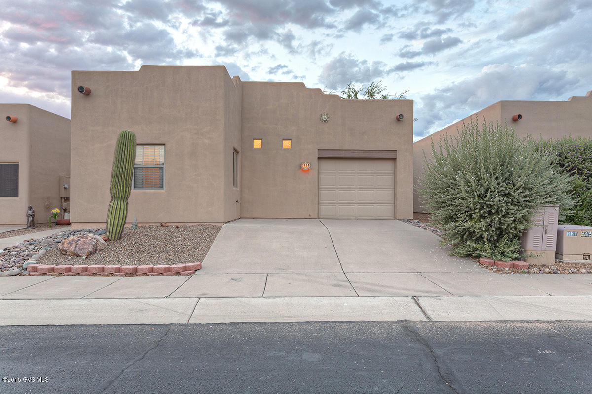 This SINGLE FAMILY Home has just had its exterior painted, its roof coated and a New Heat Pump all in November 2015! Just waiting for new homeowners!
 The open floor plan with a built in Buffet/Wet Bar allows for easy entertaining.Tile throughout; Two bedrooms and Two bathrooms; One car Garage. Convenient location to the Green Valley Recreation Center makes this an ideal ''Winter Retreat'' or year round residence. All Furnishings available by Separate Bill of Sale. Buyer shall honor lease from March 1, 2016 through April 1, 2016. Monthly Rental income is $2,200.The Listing Agent is related to the seller by marriage. The Listing agent has no ownership in this property.