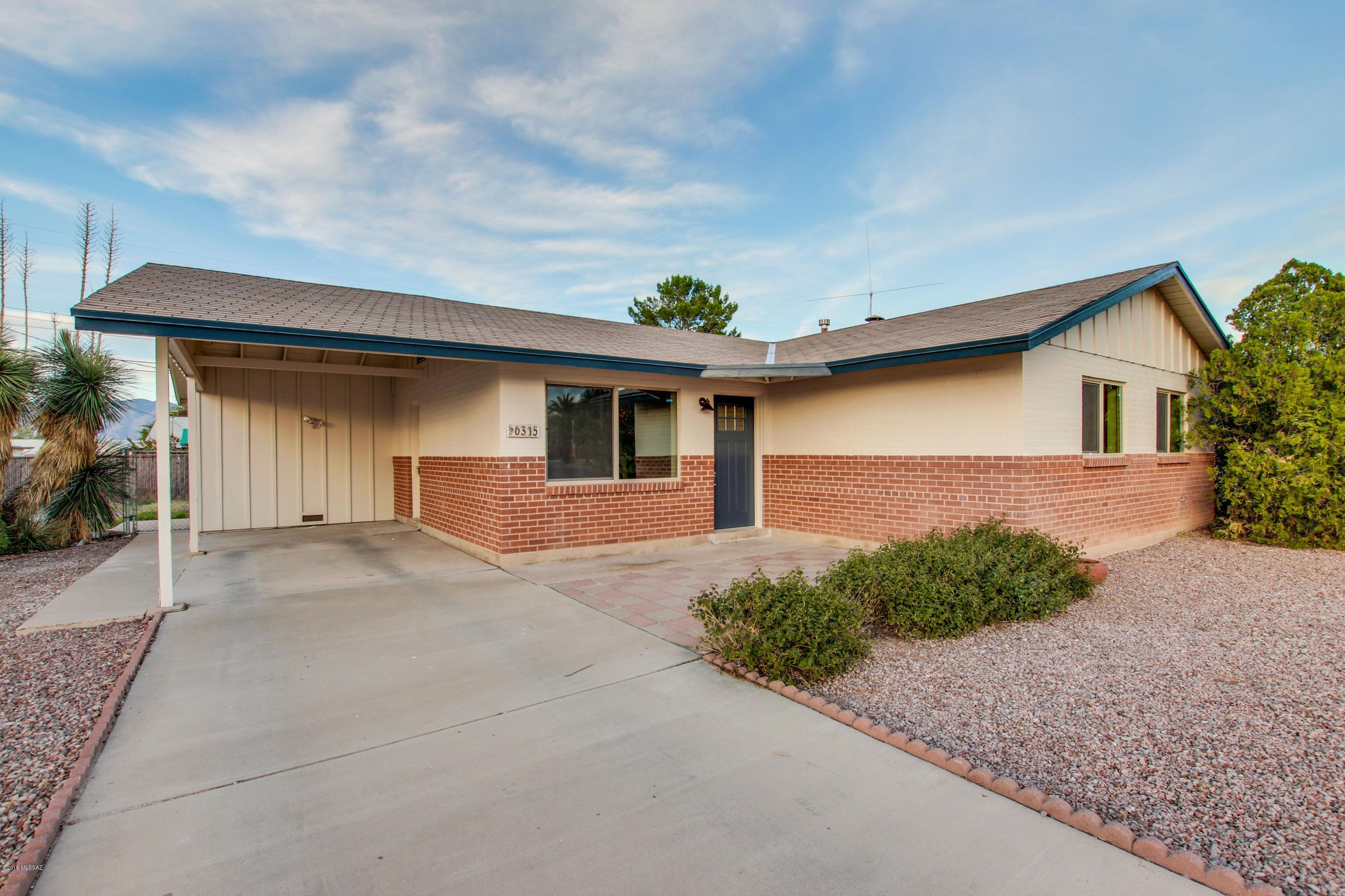 This move-in ready home has been completely redone. Wonderful clean color palette.   Bright-open floor plan. Fresh paint, new carpet, and new faux wood flooring. Numerous cozy touches throughout the home including newly remodeled bathrooms and a new kitchen complete with new range, dishwasher, microwave, quartz counter tops, and subway tile back splash. Owner/agent