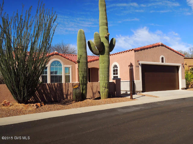 A premier residence in Rancho Resort, an award-winning gated community with an active adult lifestyle. Beautifully designed home, on spacious corner lot, professionally landscaped with southwest charm. Relax on the covered patio & enjoy colorful evening sunsets. Newly painted exterior. French drains surrounding patio & back yard. Dessert-Aire AC/Furnace with warranty & new 40-gallon water heater with warranty. Interior has spacious garden room/den with tile floor & french doors to back patio.Kitchen has skylight with large gourmet island. Dinning room with french doors to covered patio area. Living room with gas fireplace & vaulted ceiling is open to kitchen & dinning area. Master Suite with 5-piece master bath features skylight, Jacuzzi tub & walk in closet. "as is" Addendum, see  docs. the patio. Newer furnace freshly painted inside. No GVR all amenites of Rancho Resort.