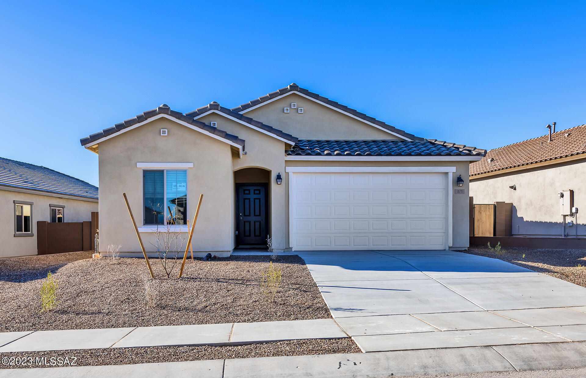 Move-in Dec 2022.  Homesite with front yard landscaping and sweeping views backs to desert landscape common area.  This house features a professionally designed neutral interior with all appliances including washer/dryer/refrigerator; (pre-plumb for gas and electric at range).  The kitchen offers granite countertops, Whirlpool stainless-steel appliances, 36'' Cabinets with crown molding and hardware.  White WP washer/dryer, faux wood window blinds on front windows.  Quality energy efficient features include Carrier HVAC (gas) and Rinnai tankless water heater.