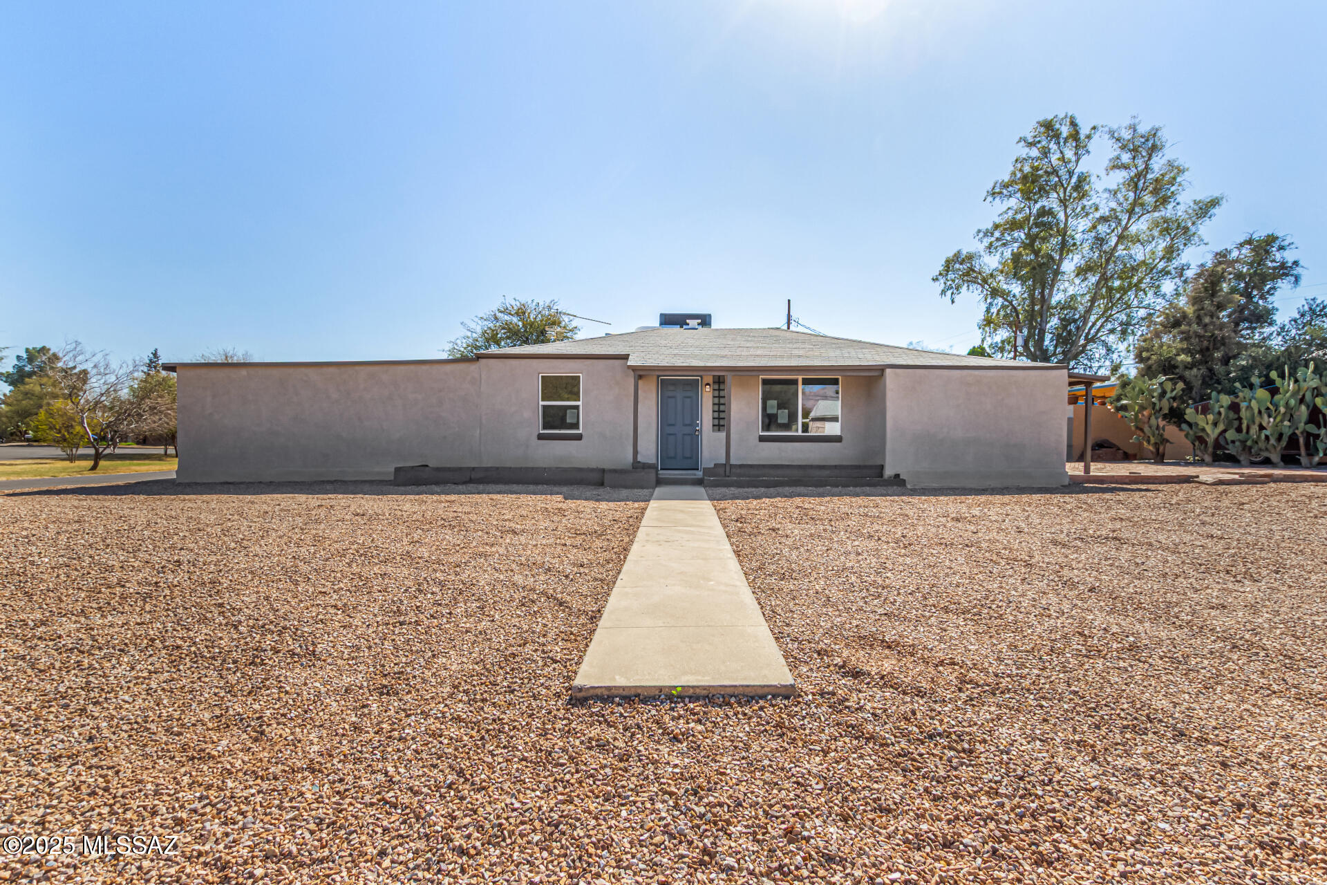 Charming Corner Lot Gem in Poets Square! Don't miss this incredible opportunity to own a beautiful 3bd/2ba + den home in highly sought-after Poets Square neighborhood! Step inside to discover updated interiors, including granite countertops, modern cabinetry, and SS appliances in the kitchen. The home boasts dual-pane windows for energy efficiency, a living room and a cozy family room complete with a wood-burning fireplace, perfect for relaxing evenings. The primary suite is a true retreat, featuring dual vanities and an oversized walk-in shower. Outside, enjoy the expansive front and rear patios, ideal for entertaining or unwinding. The property also includes a 3-car carport, a shed/workshop.